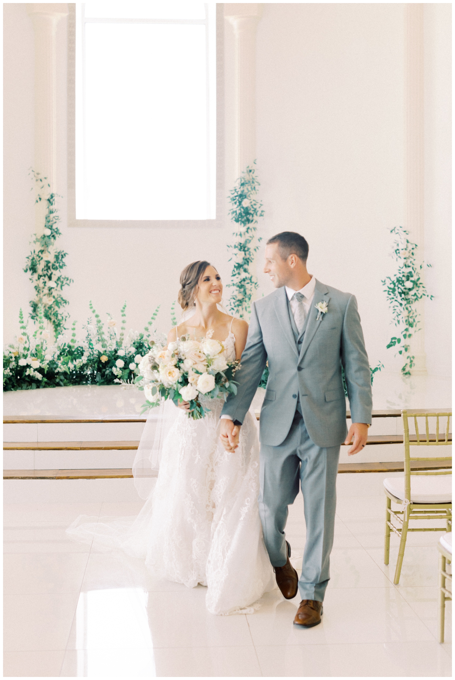 bride and groom walking down aisle at Citadel Houston