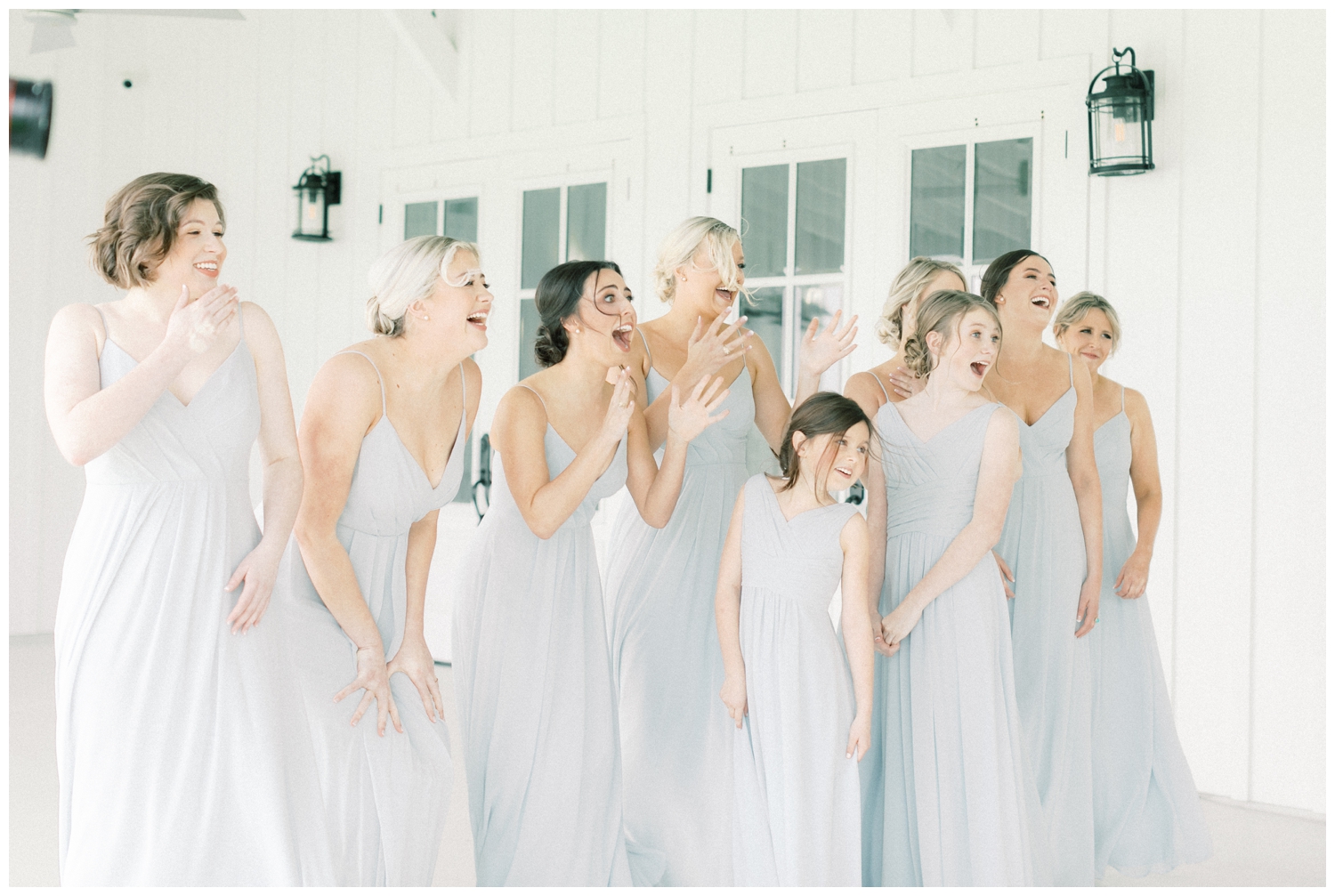 bridesmaids reactions seeing bride at The Farmhouse wedding venue