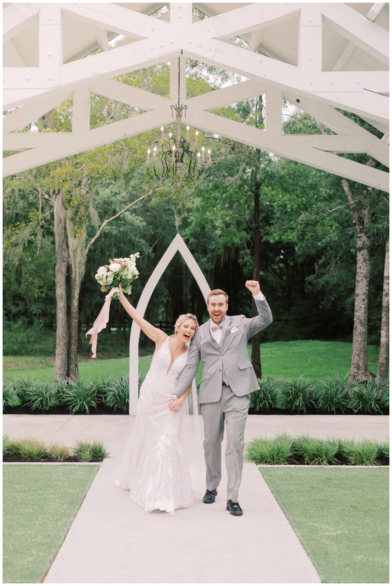 couple celebrating after ceremony at Springs Wallisville venue