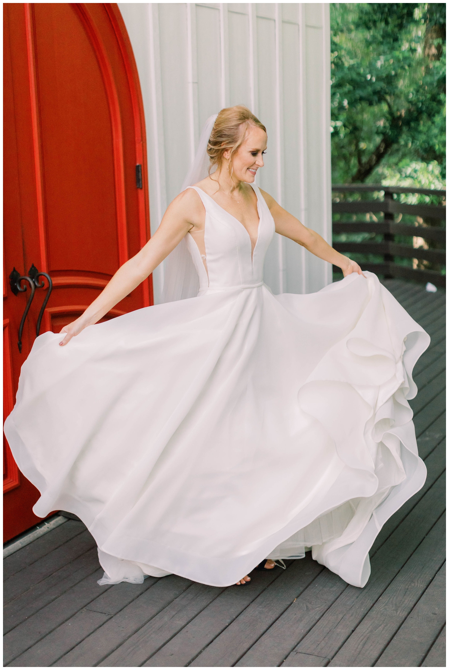 a-bridal portrait-of-bride-twirling-wedding-dress