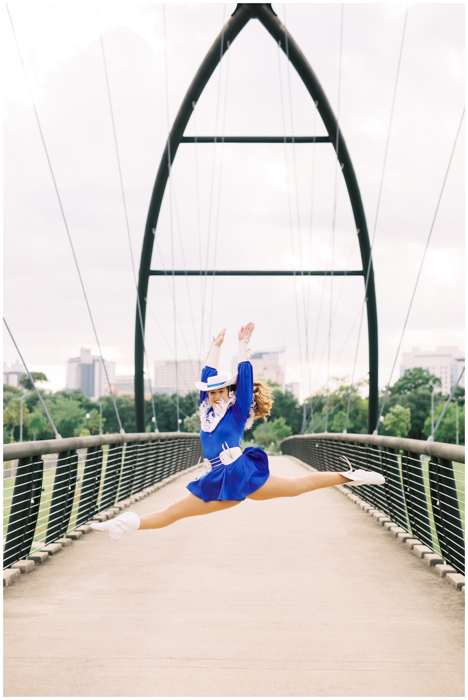 dancer leaping on a bridge at Hermann Park Houston Reed Gallagher Photography