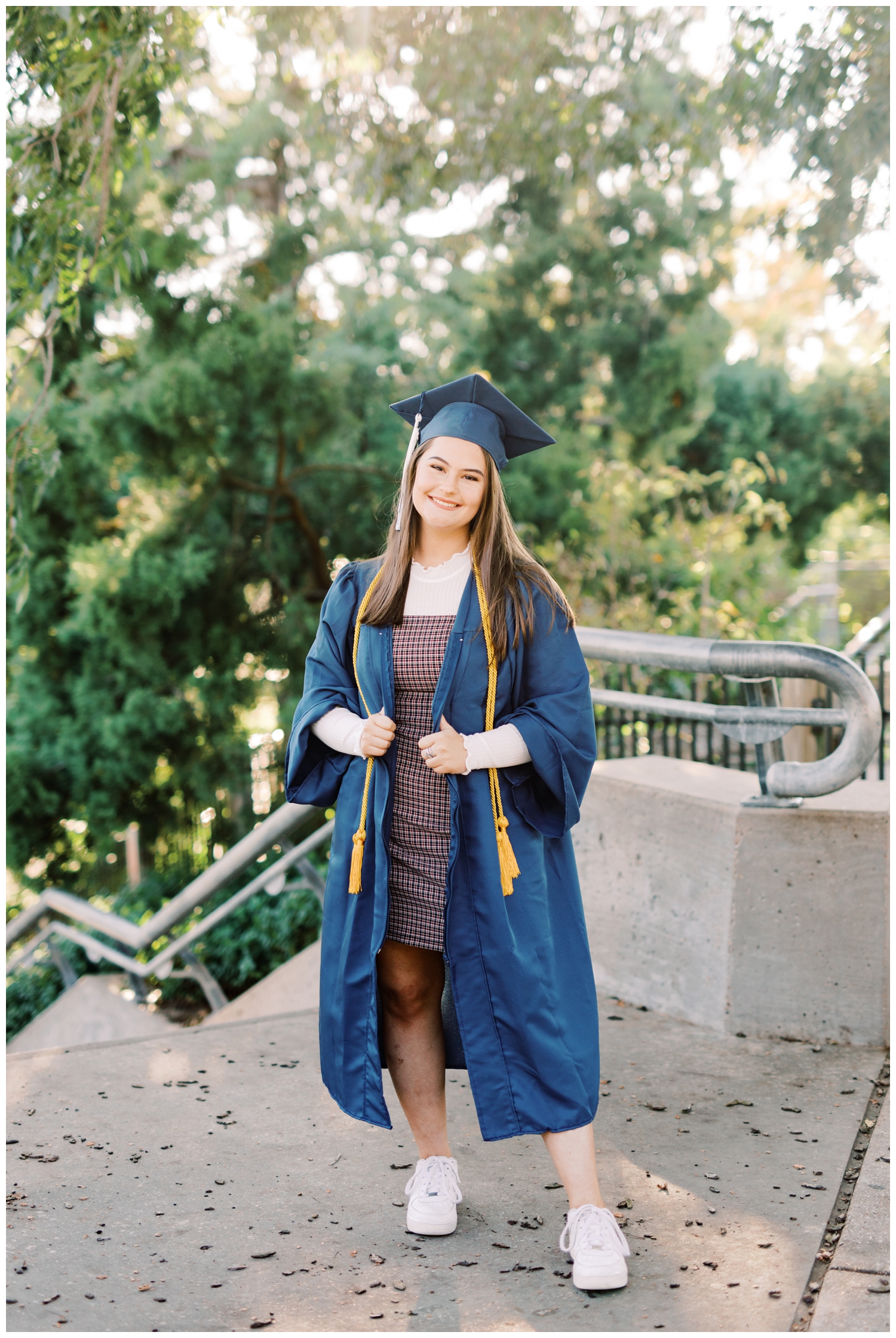 senior girl in cap and gown portrait downtown houston