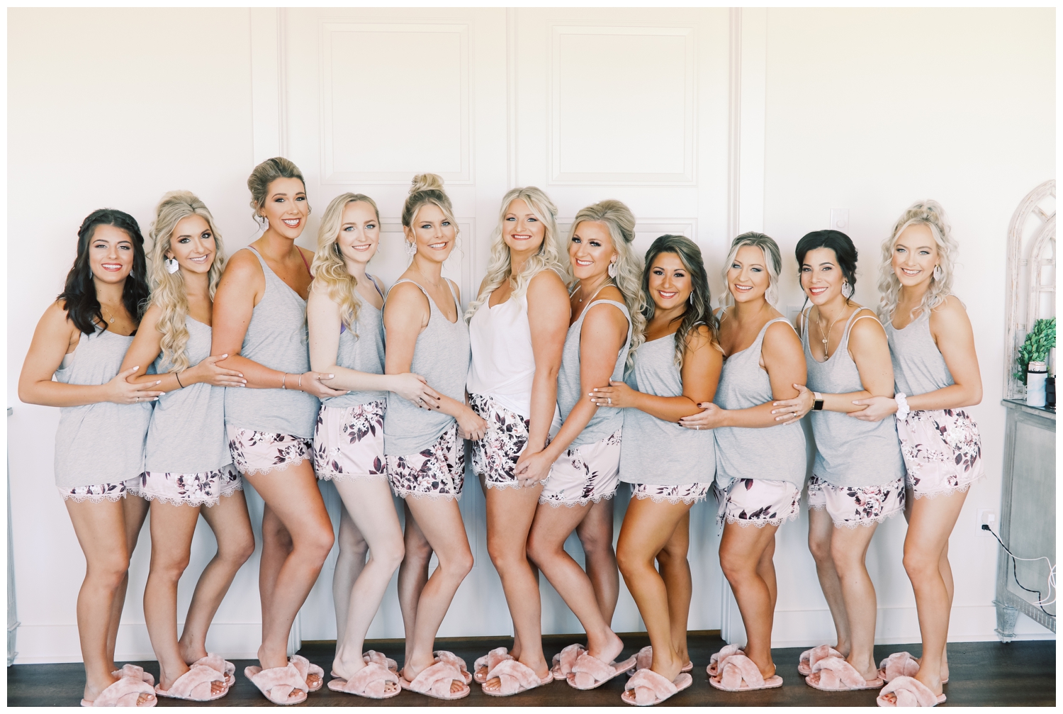 bridesmaids and bride in robes at Deep In The Heart Farms bridal suite
