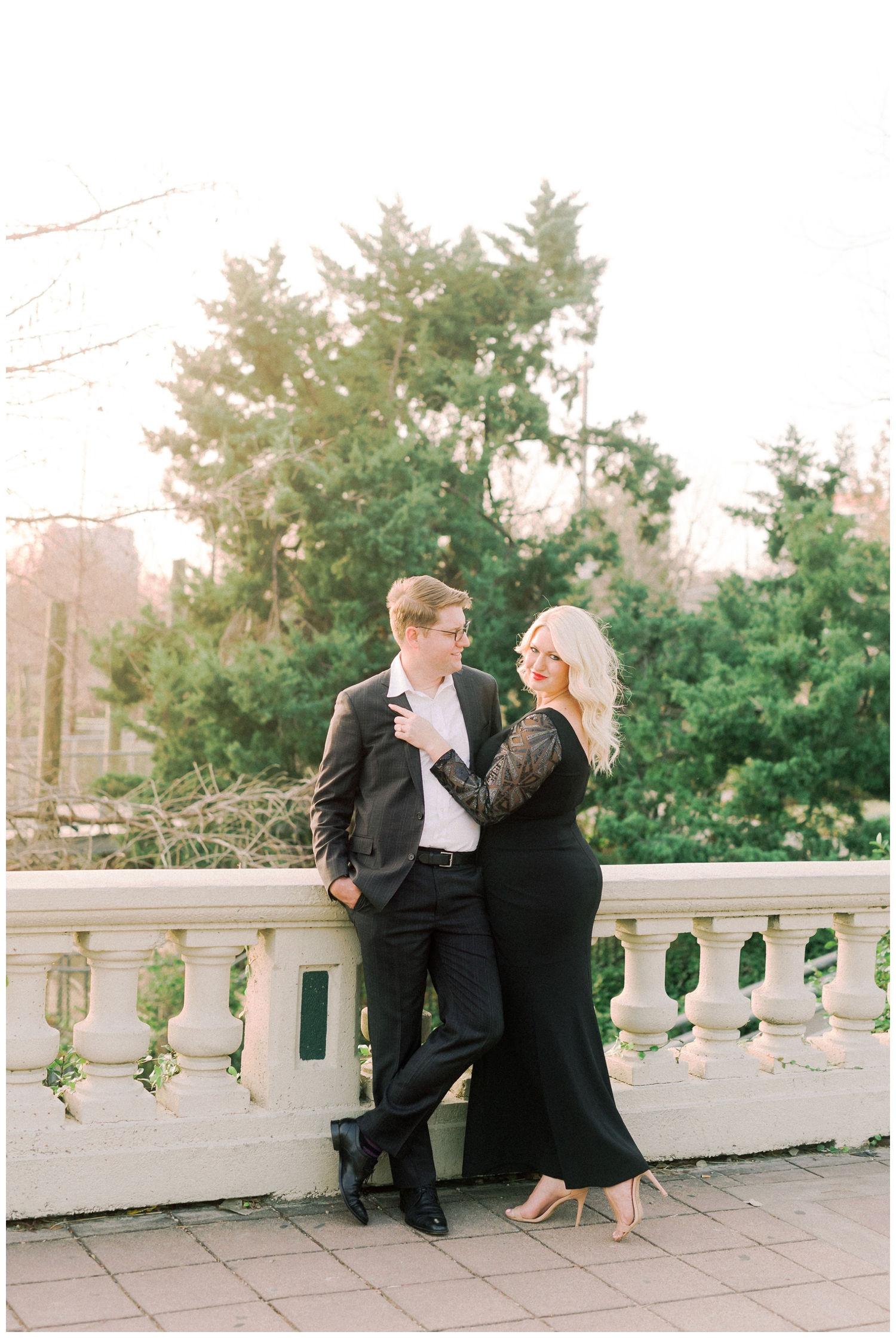 engaged couple on Sabine bridge in all black formal attire