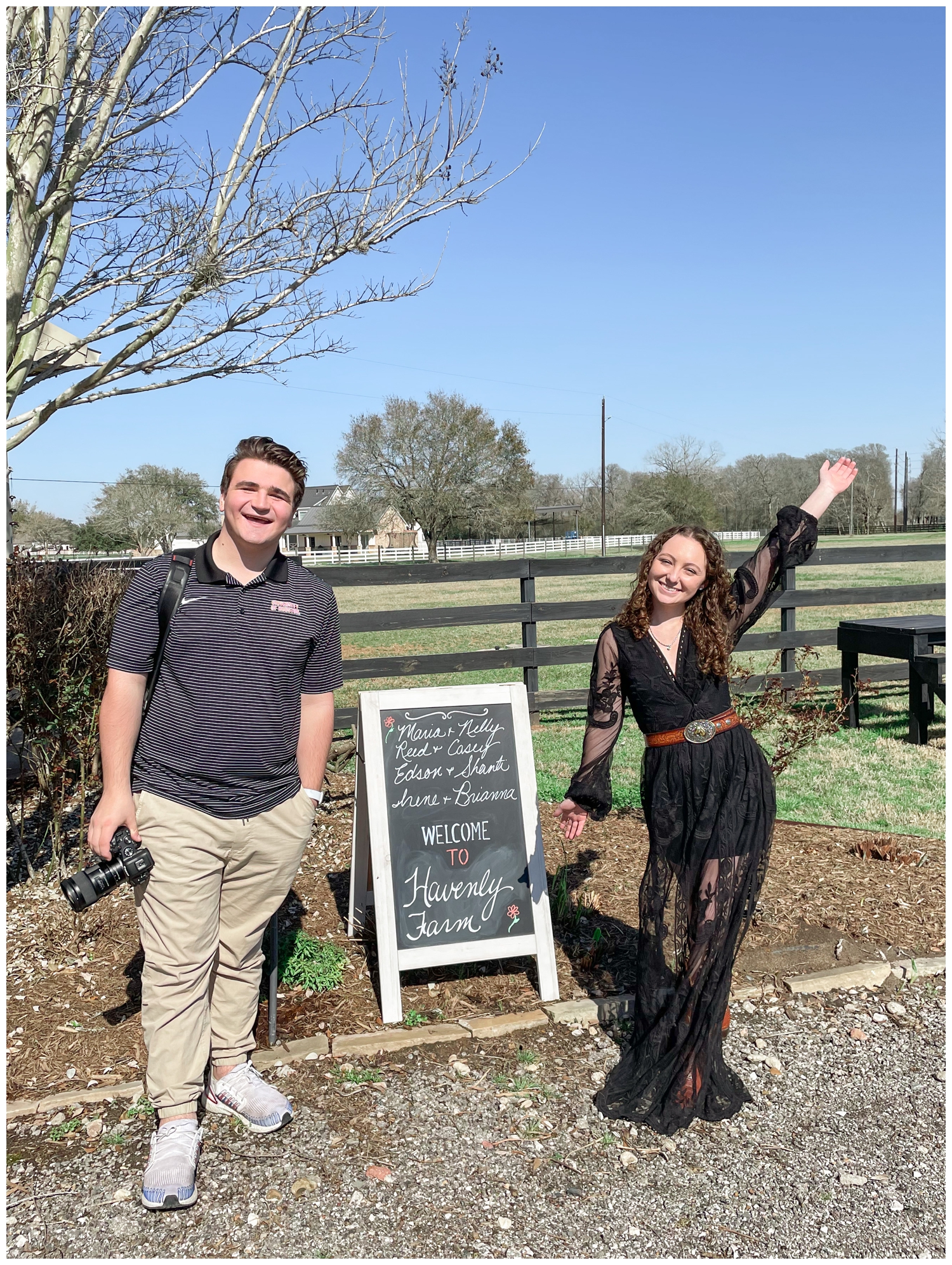 high school senior standing with Reed Gallagher Photography by a sign during Cypress Senior session at Havenly Farm