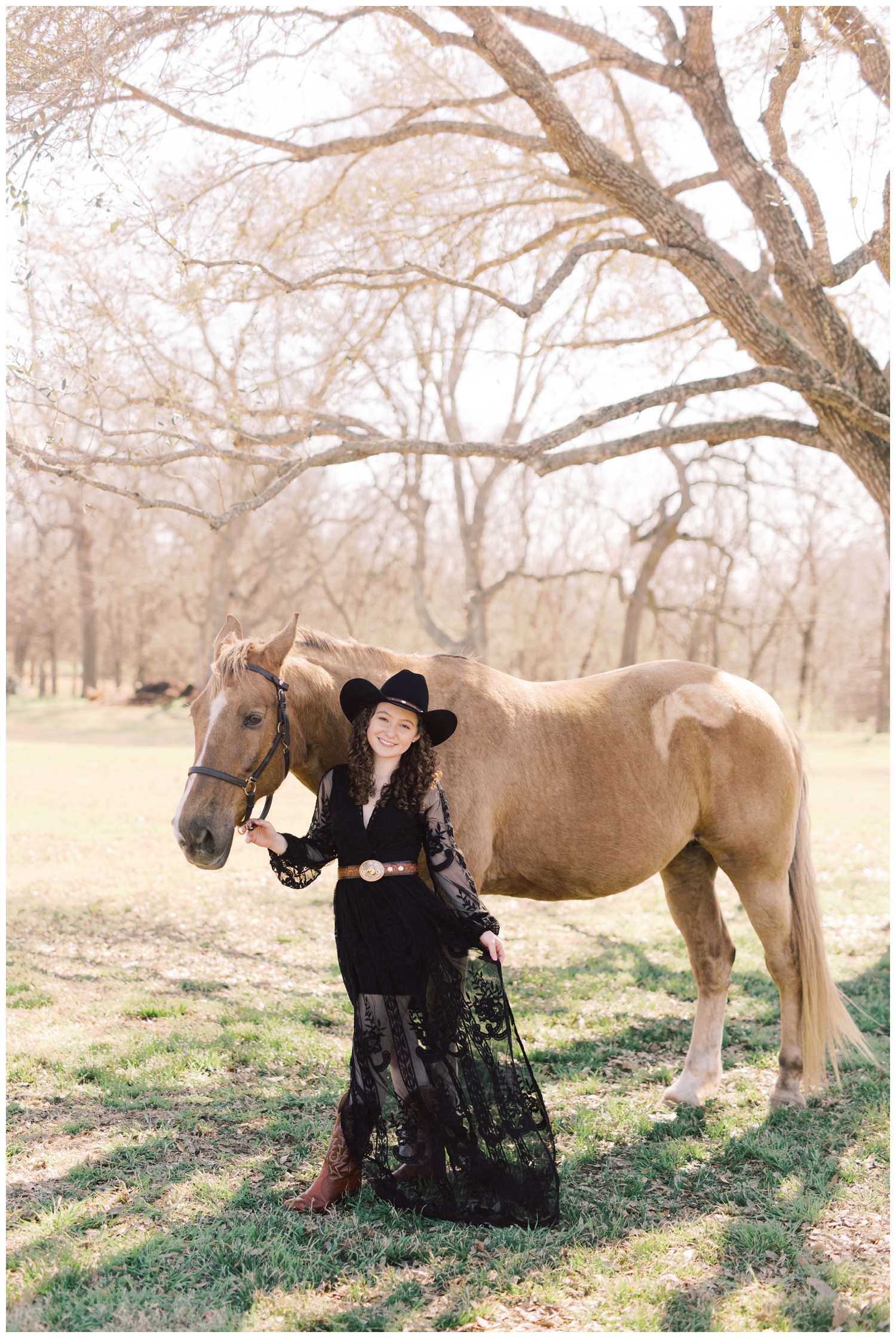 girl holding reign of a horse for Cypress senior session