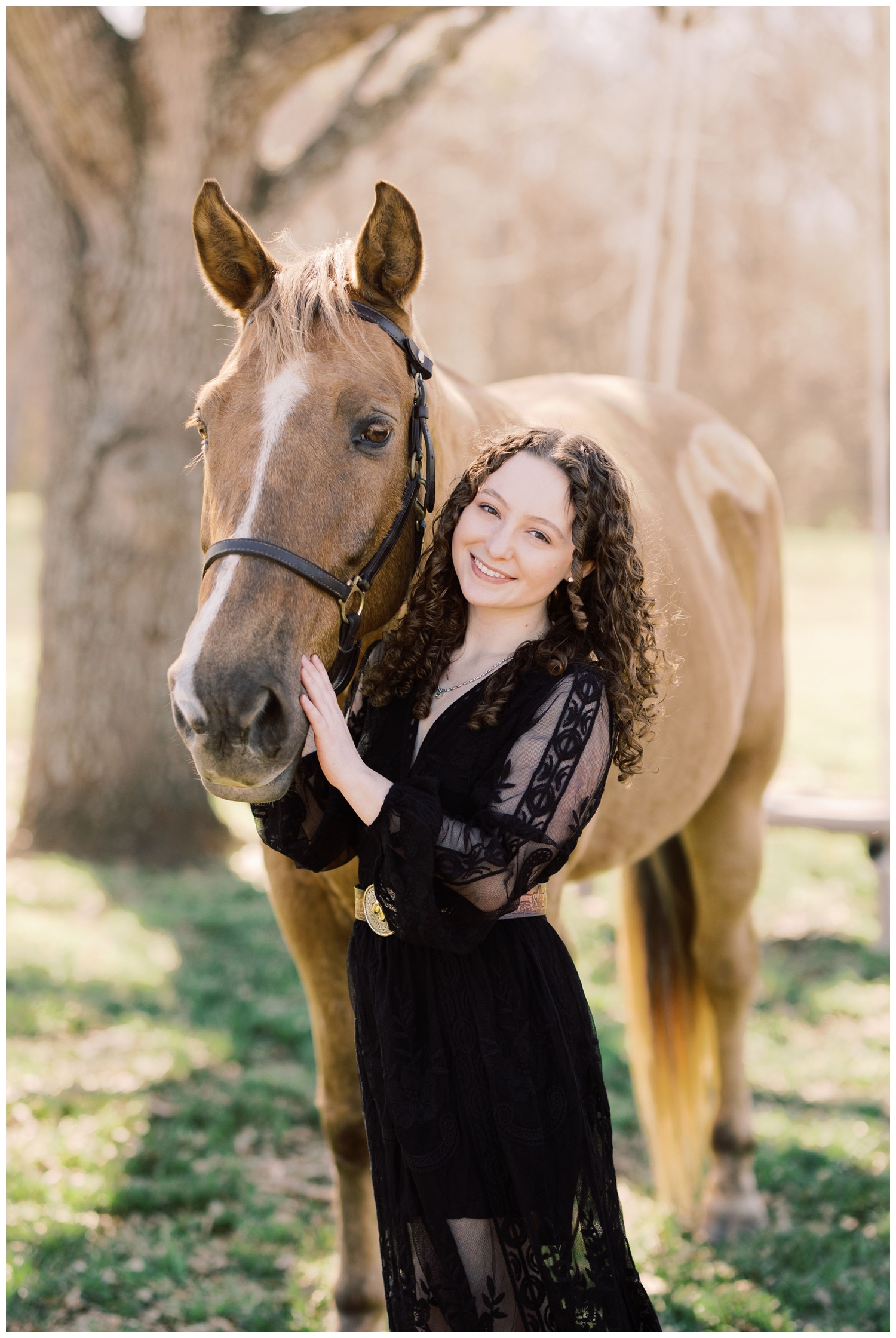 girl posing with a horse for Cypress Senior Session