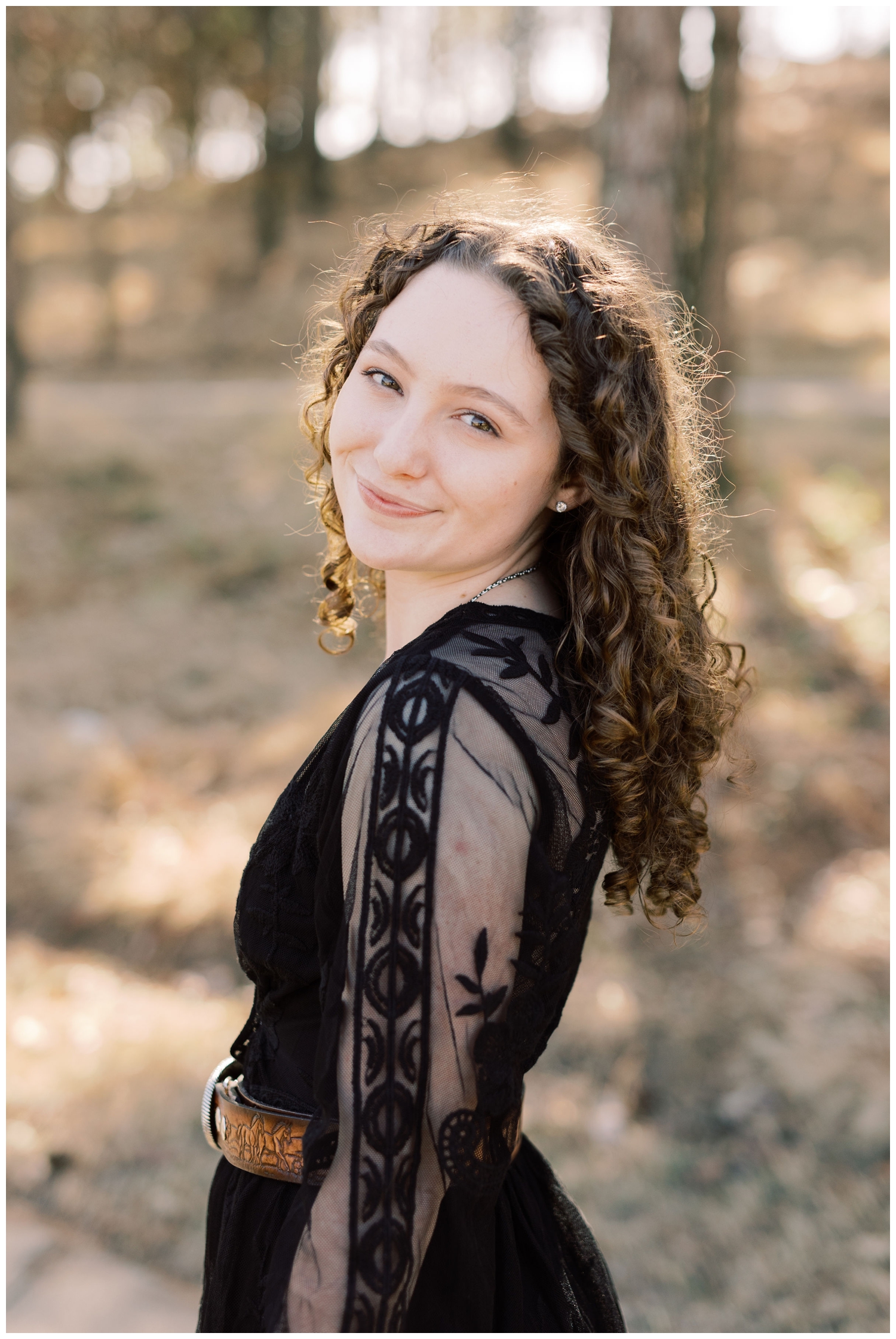 close up portrait of a senior with black dress for Cypress Senior Session