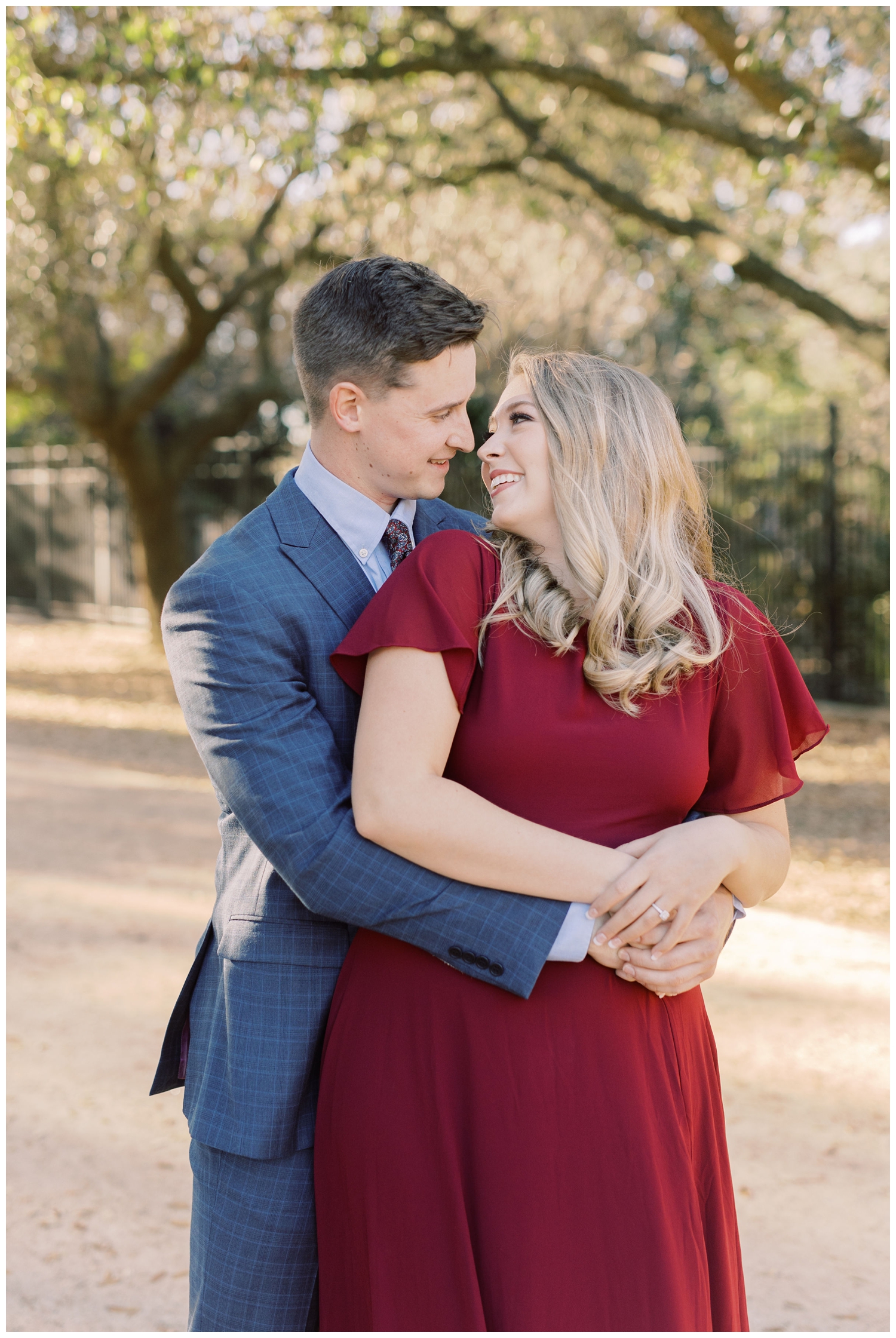 engaged couple portrait outside at Hermann Park in Houston, Texas