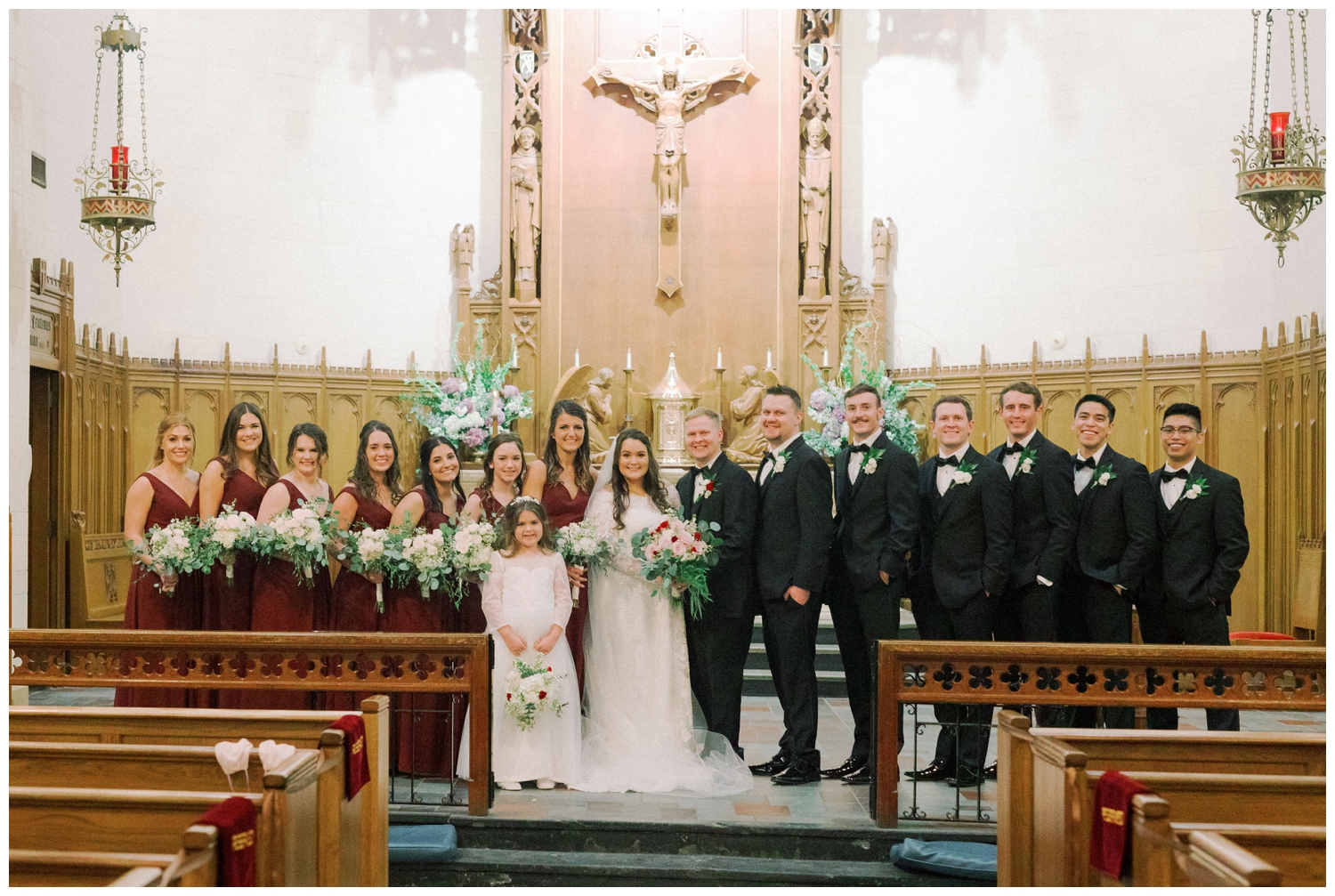 bridal party portrait after ceremony inside Holy Rosary Church