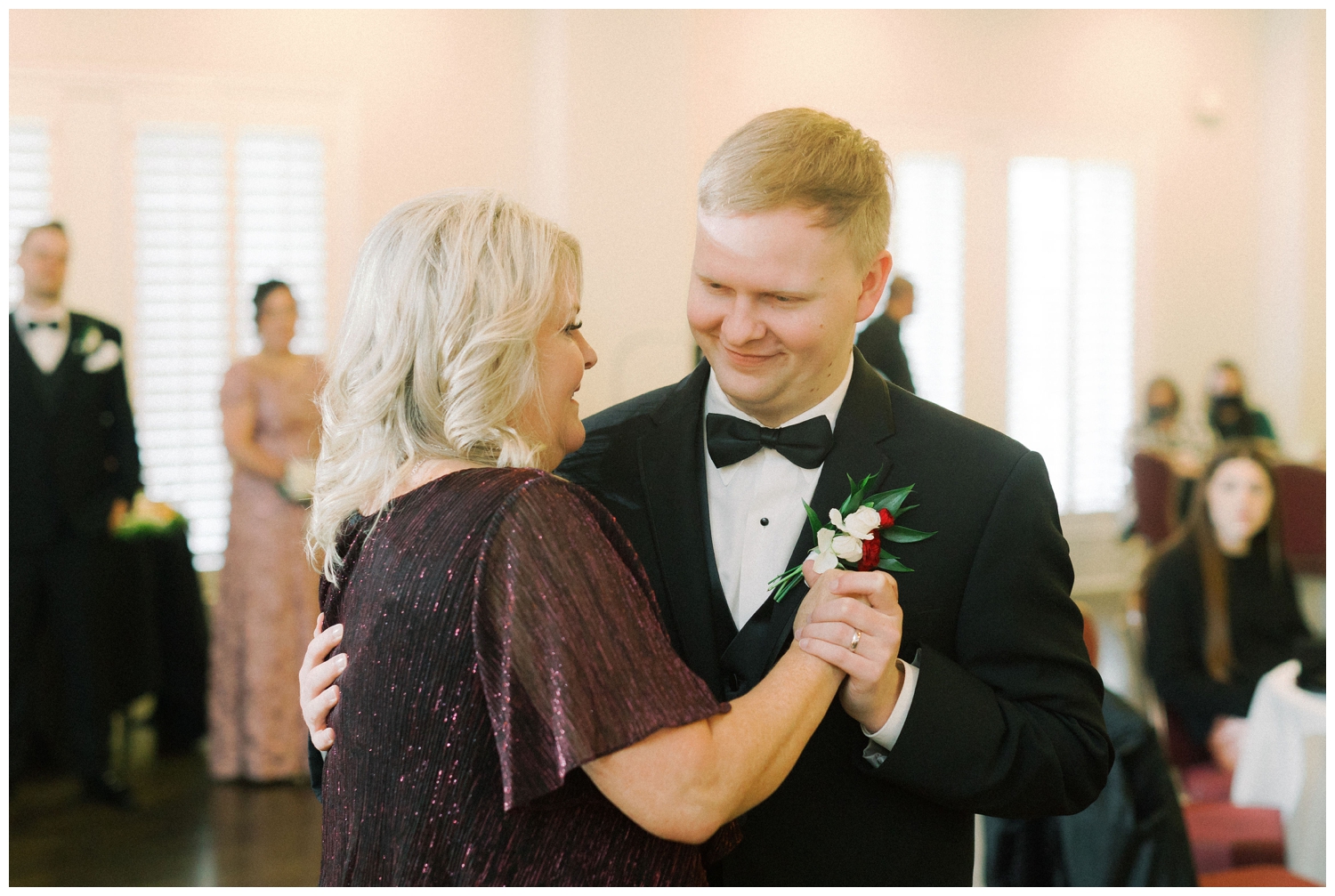 mother and son dance during wedding reception