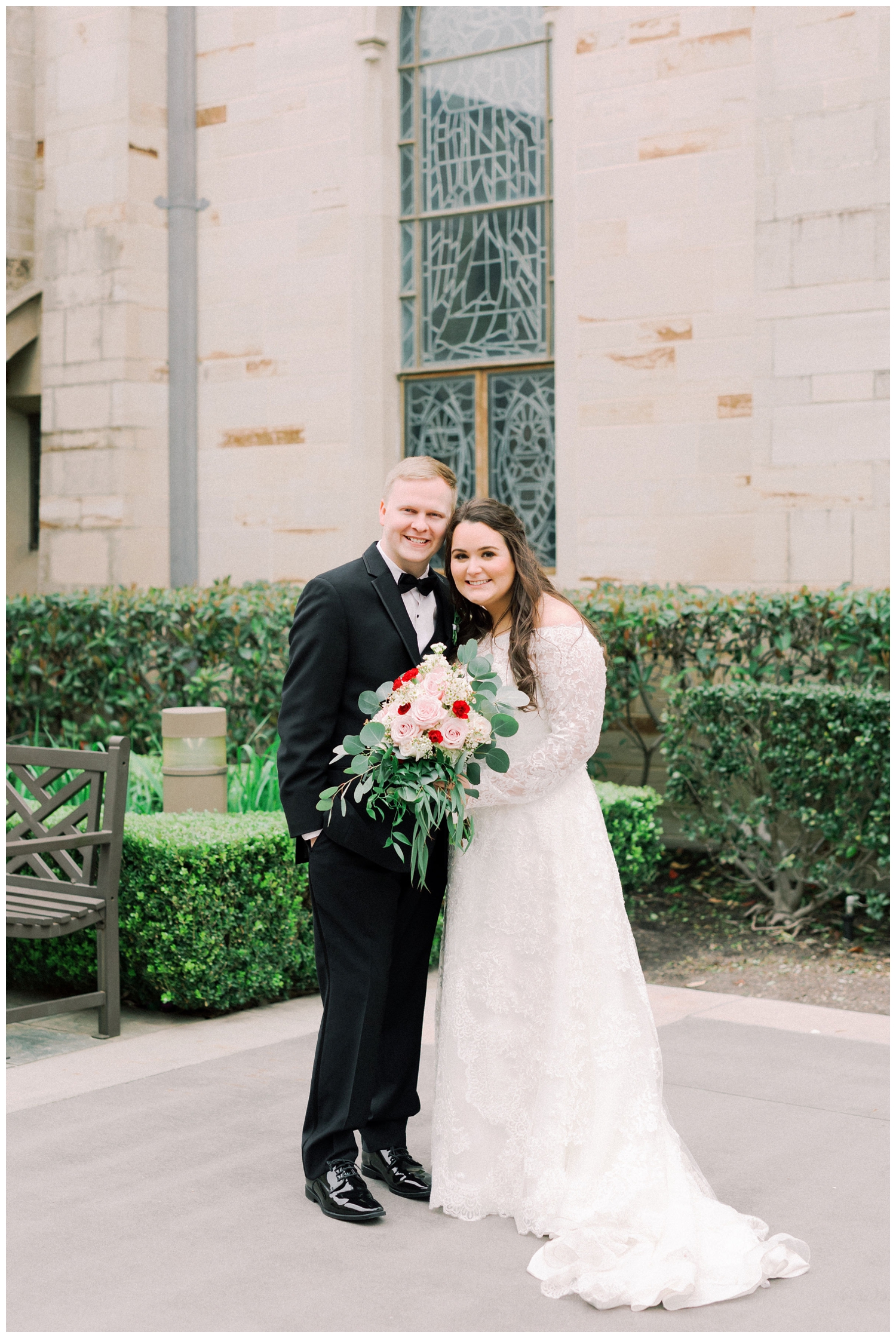 Bride and groom newlywed portraits outside Holy Rosary Church