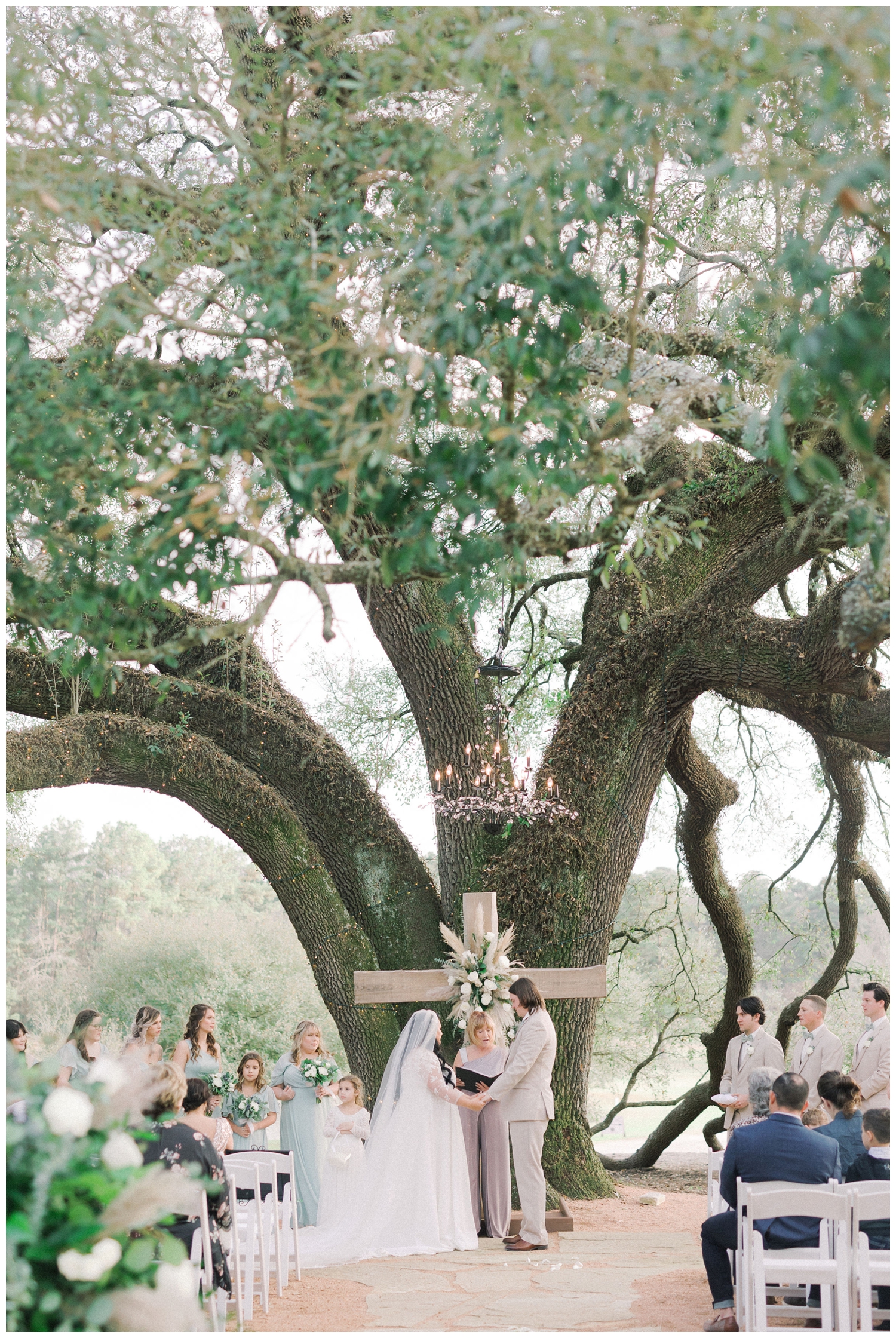outdoor wedding ceremony under oak tree at Pine Lake Ranch