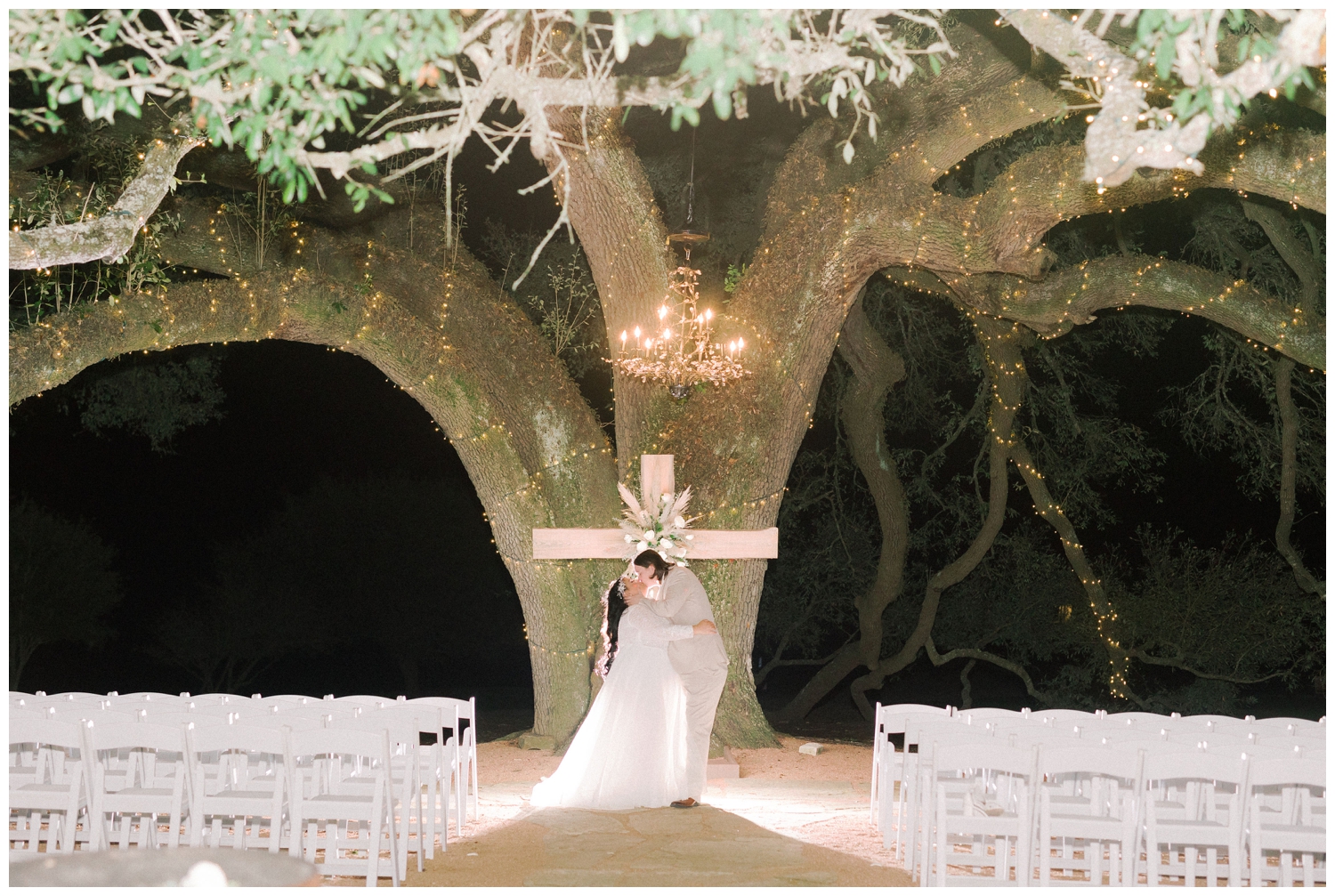 bride and groom night time portrait under oak tree
