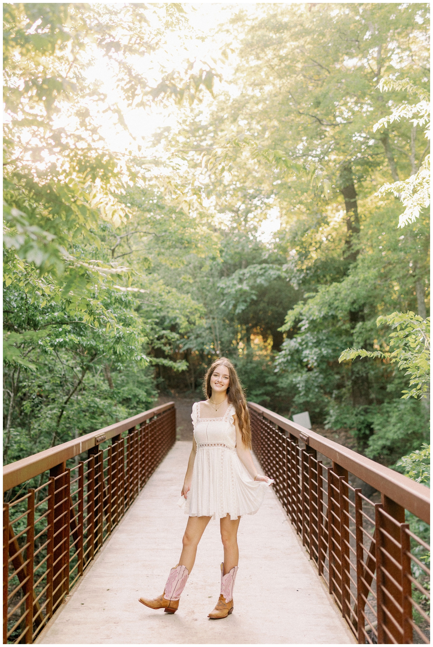 high school girl standing on a bridge at Houston Arboretum