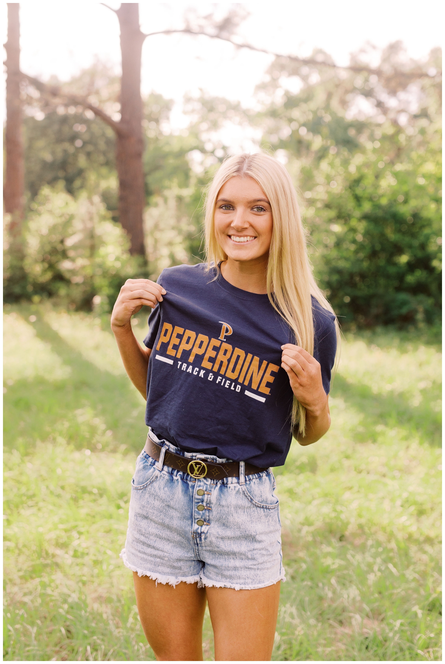 girl posing in college tshirt for Houston Senior Model Team