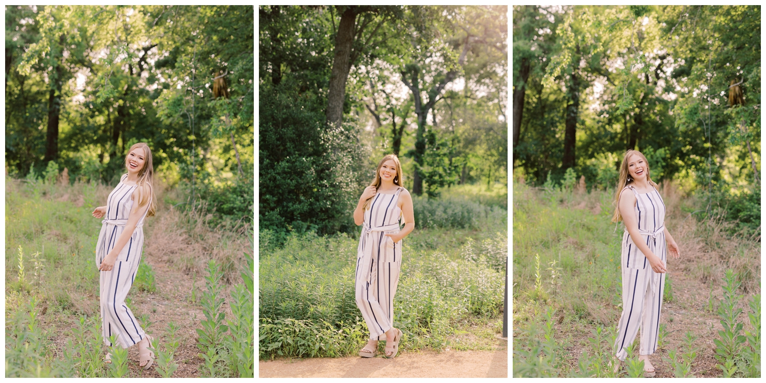 girl standing in a field in a jumpsuit