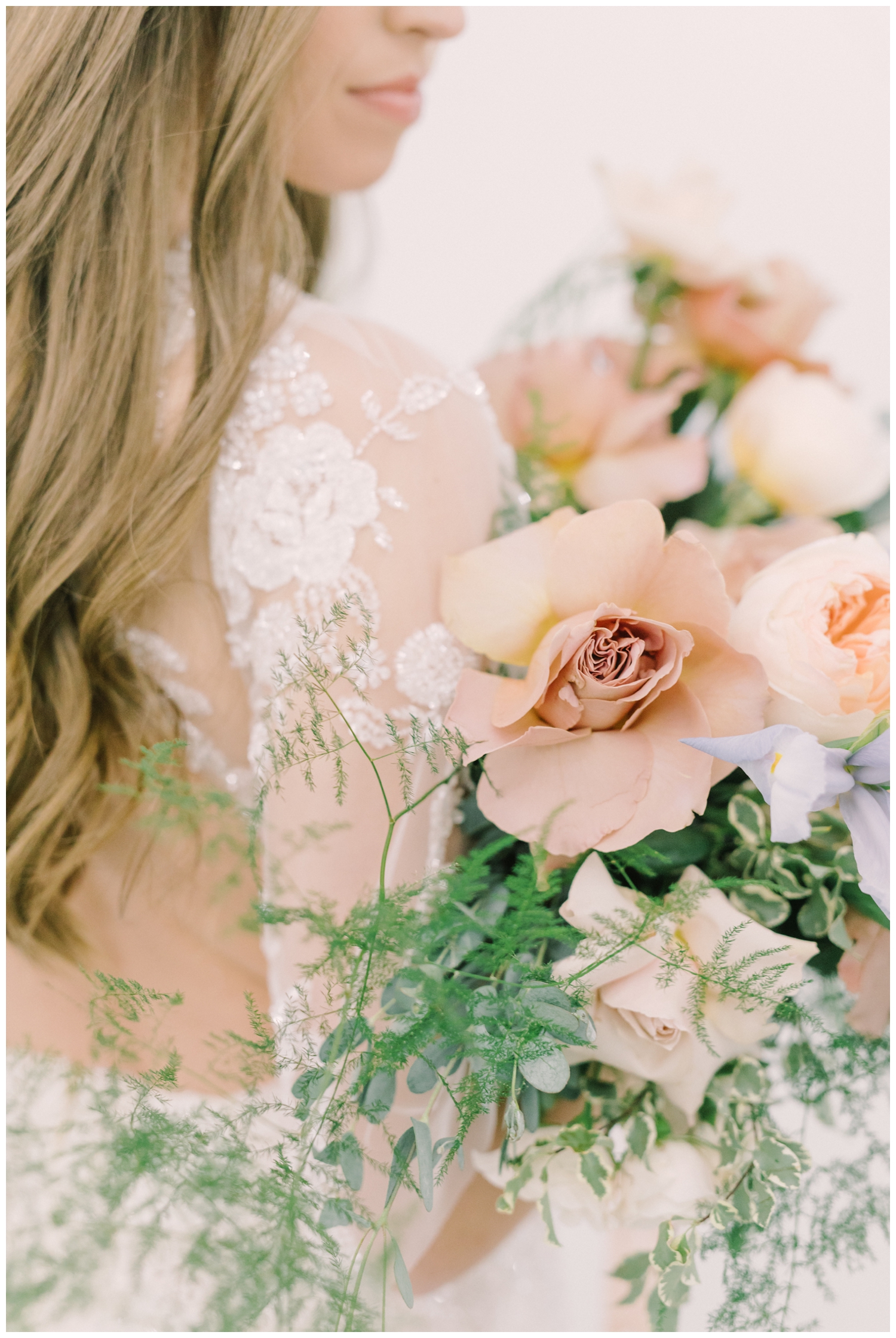 close up of a light and airy bouquet held be a bride in Houston, Texas