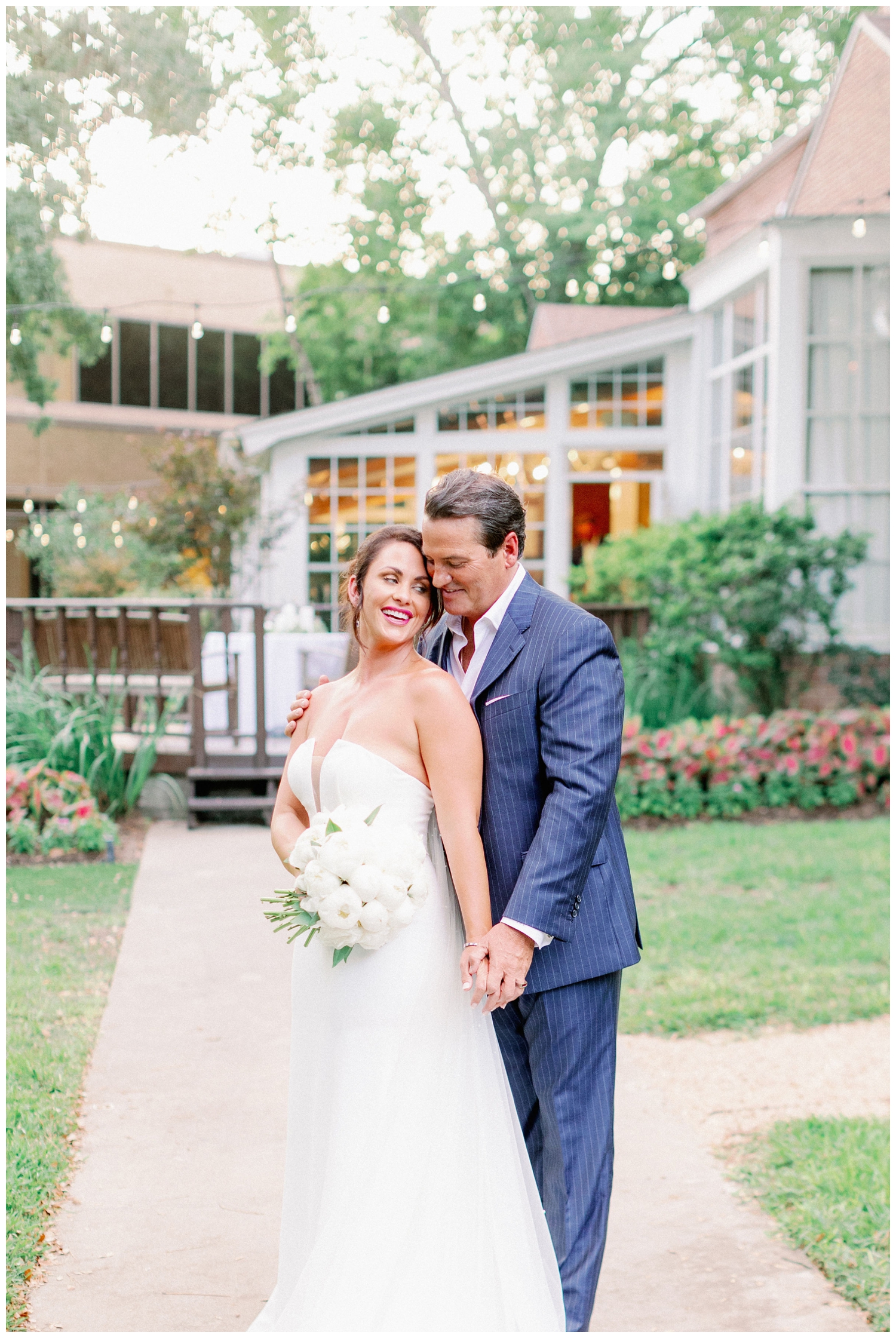 bride and groom outside The Manor House for portrait The Houstonian Hotel wedding