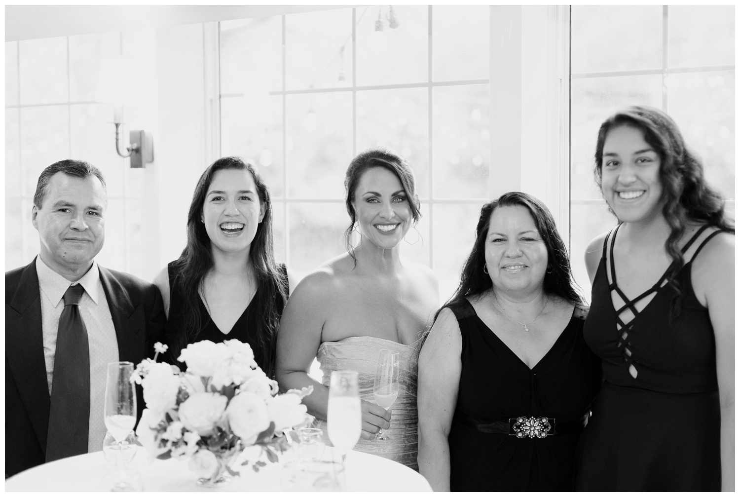 black and white photo of bride with guest inside The Manor House at The Houstonian Hotel wedding