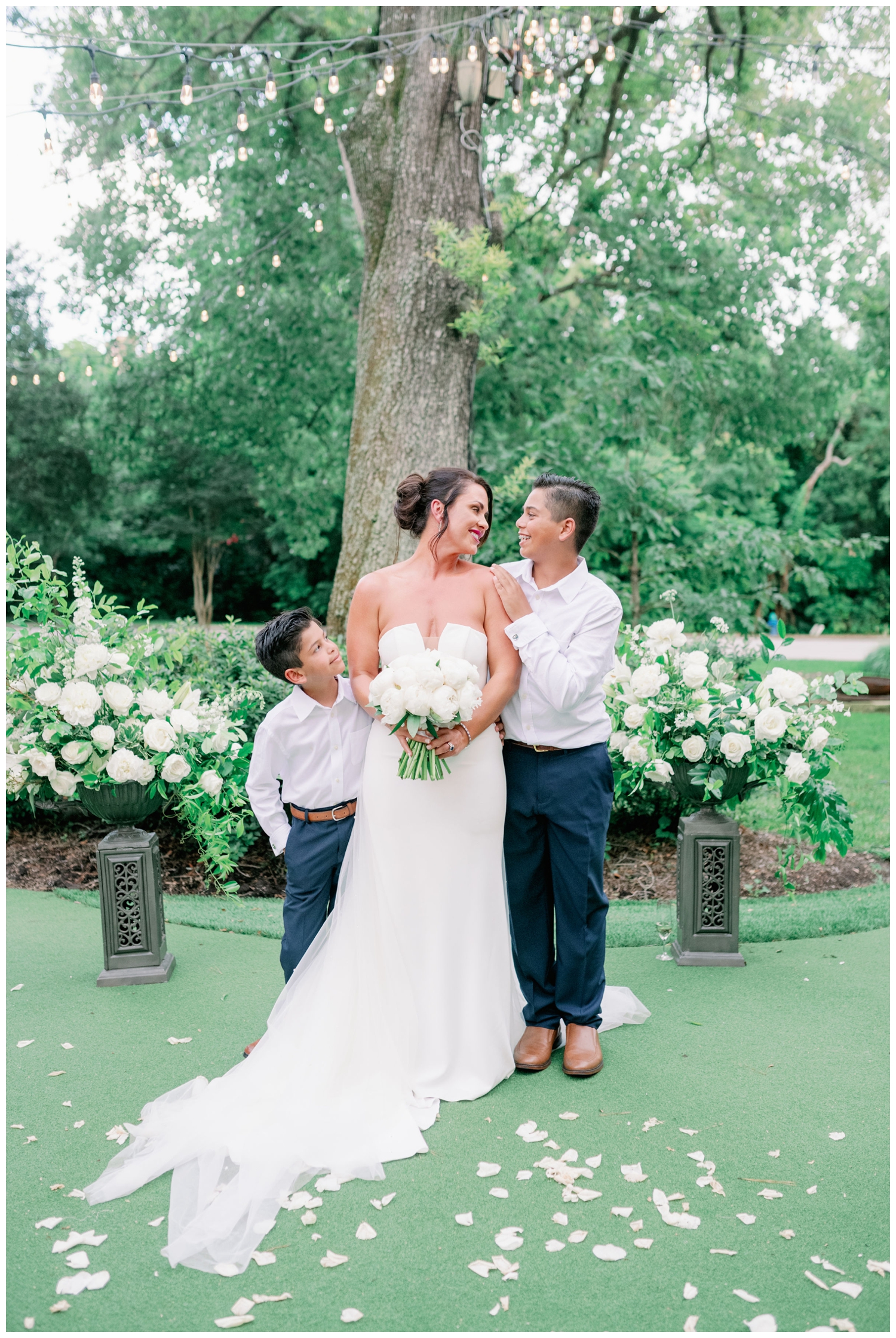 bride with two sons on the lawn The Houstonian Hotel wedding