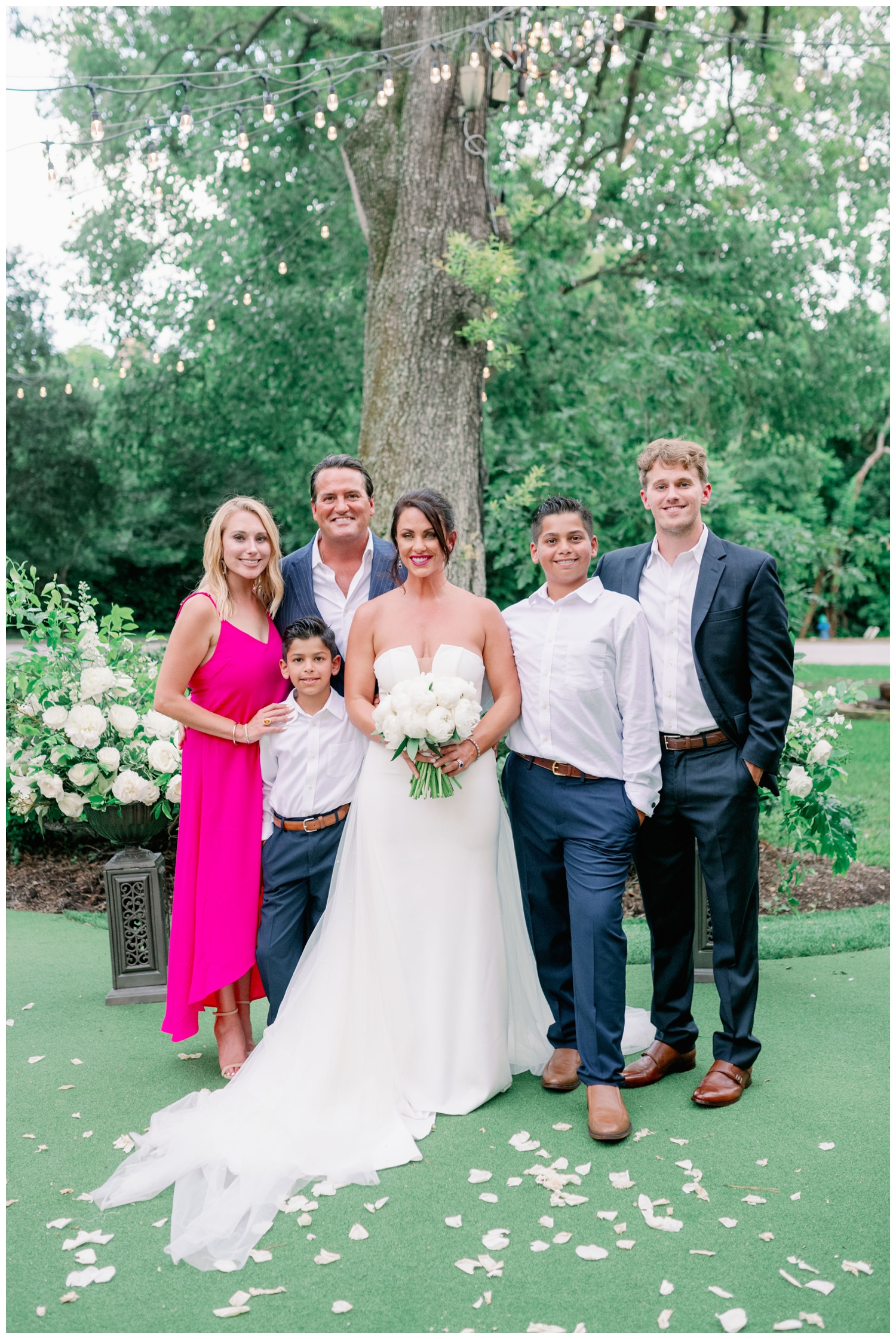 family portrait outside on the grass The Houstonian Hotel wedding
