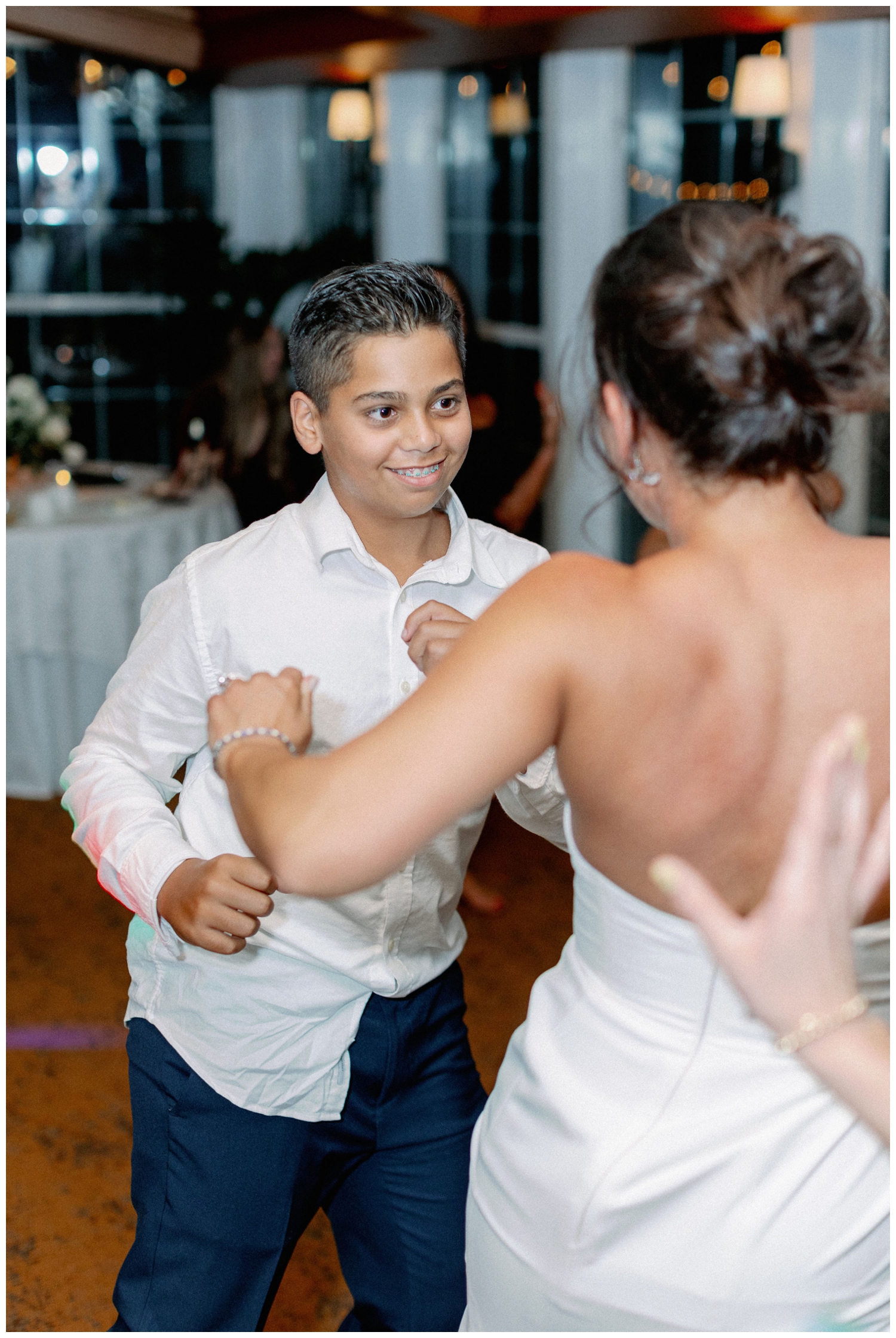 bride dancing with her son inside Manor House reception The Houstonian Hotel wedding