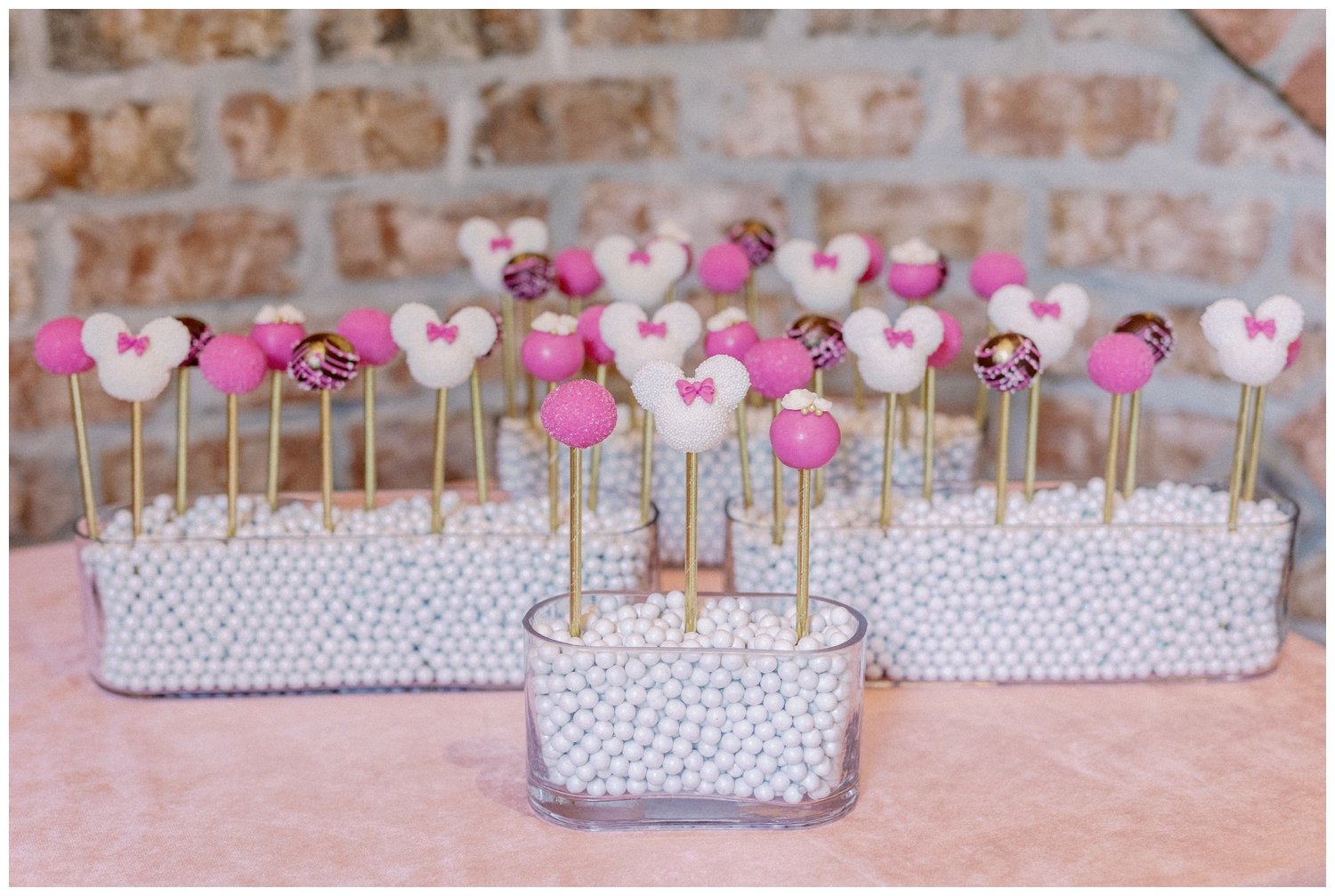 pink and white cake pops Disney shaped