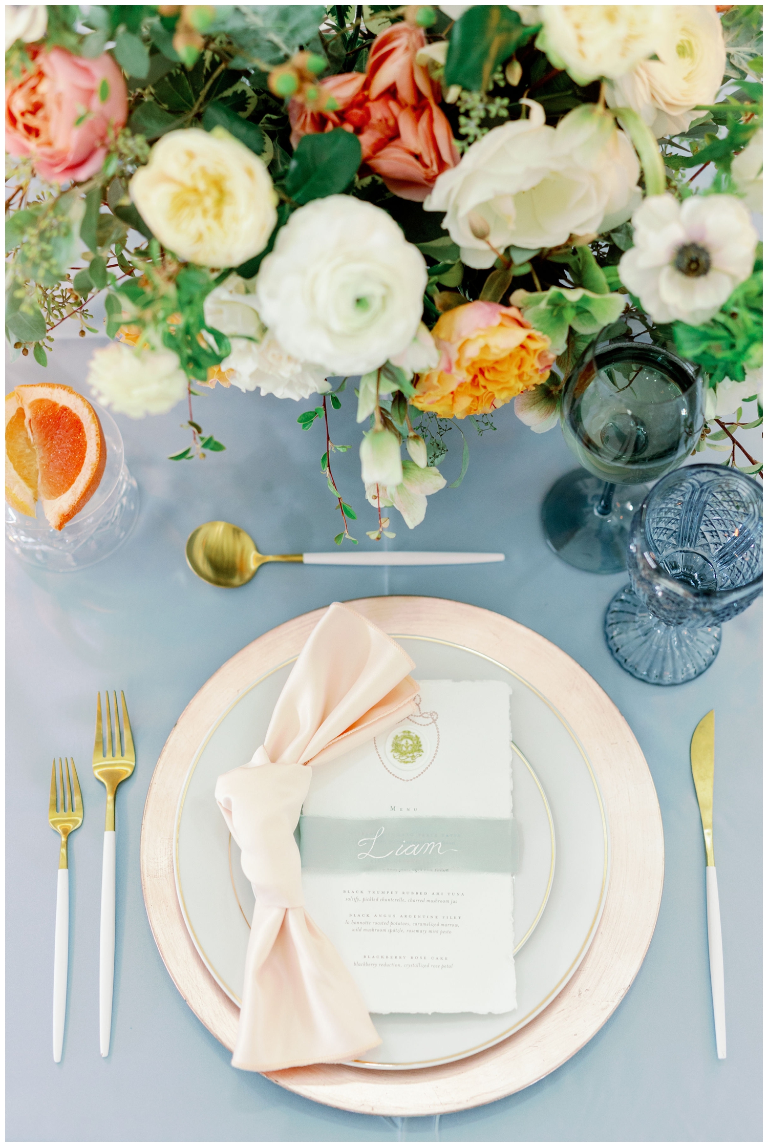 reception table details with white and gold flatware and blush placesetting he Farmhouse Wedding and Event Venue