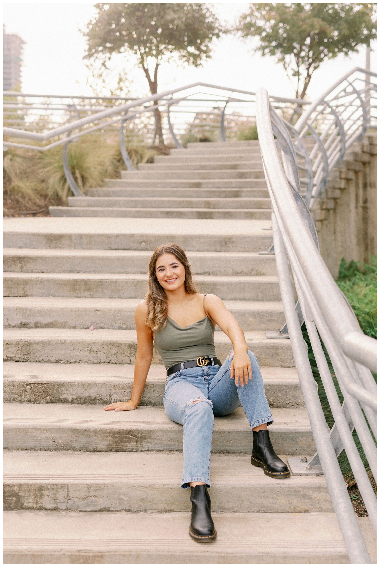 girl sitting on staircase in Buffalo bayou