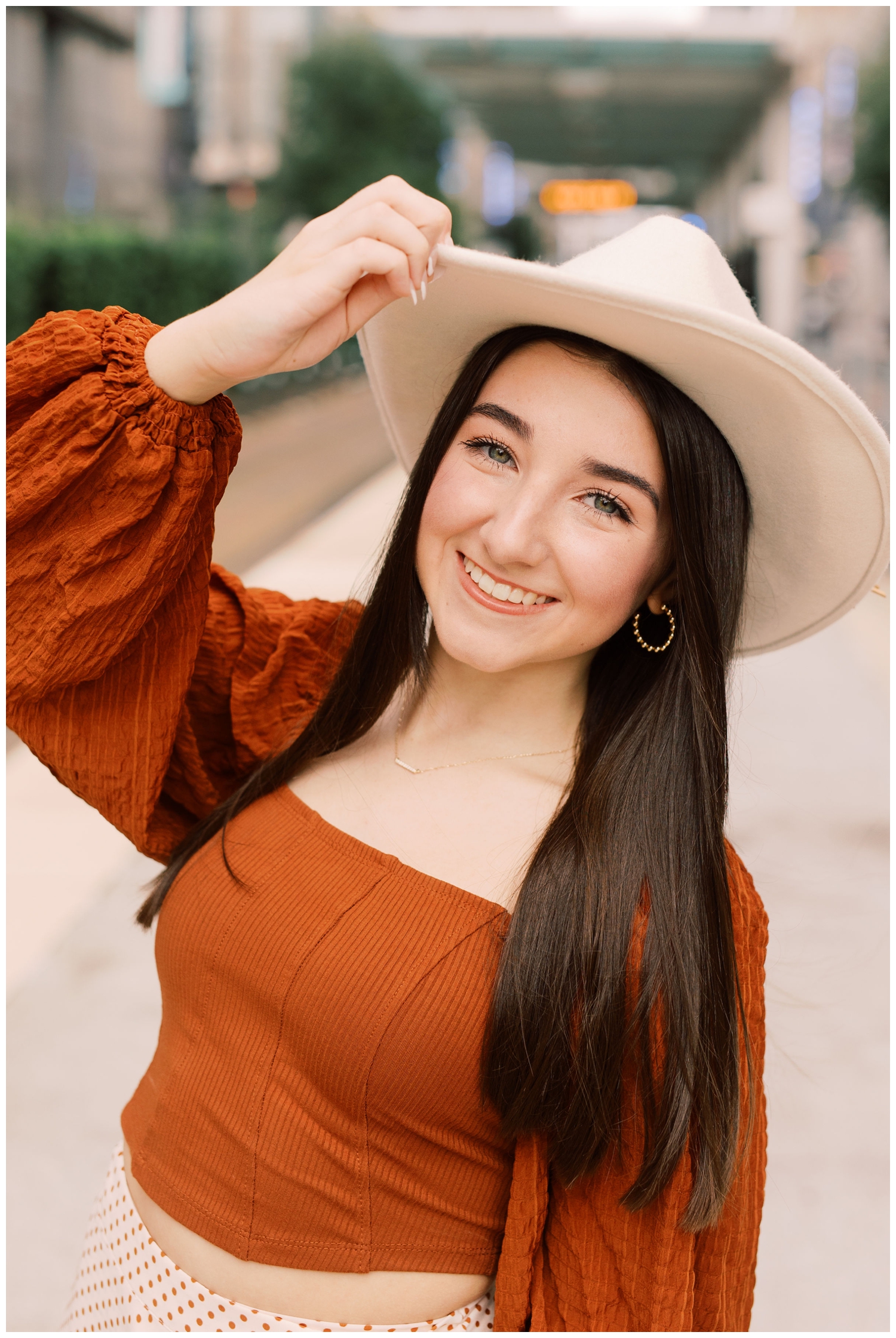 closeup portrait girl wearing cowboy hat Houston urban senior photographer