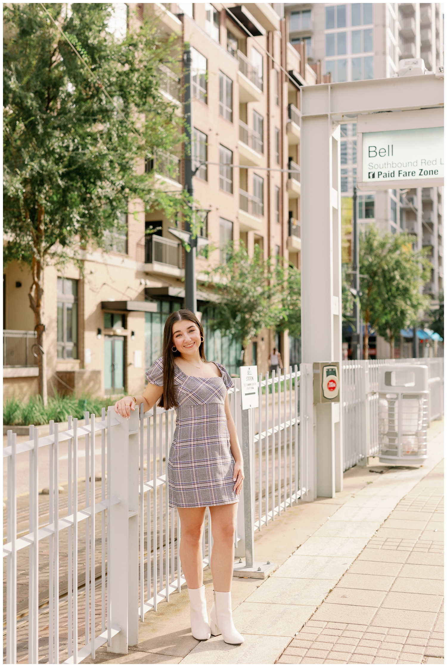 girl leaning on rail downtown Houston