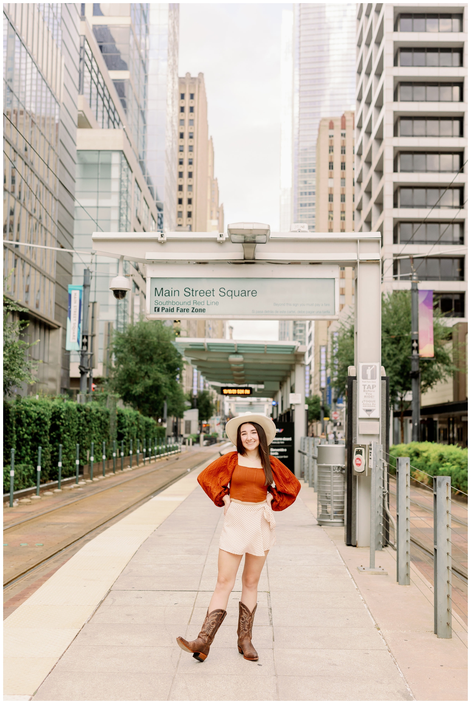 girl standing at Metro Station for Houston urban senior photographer