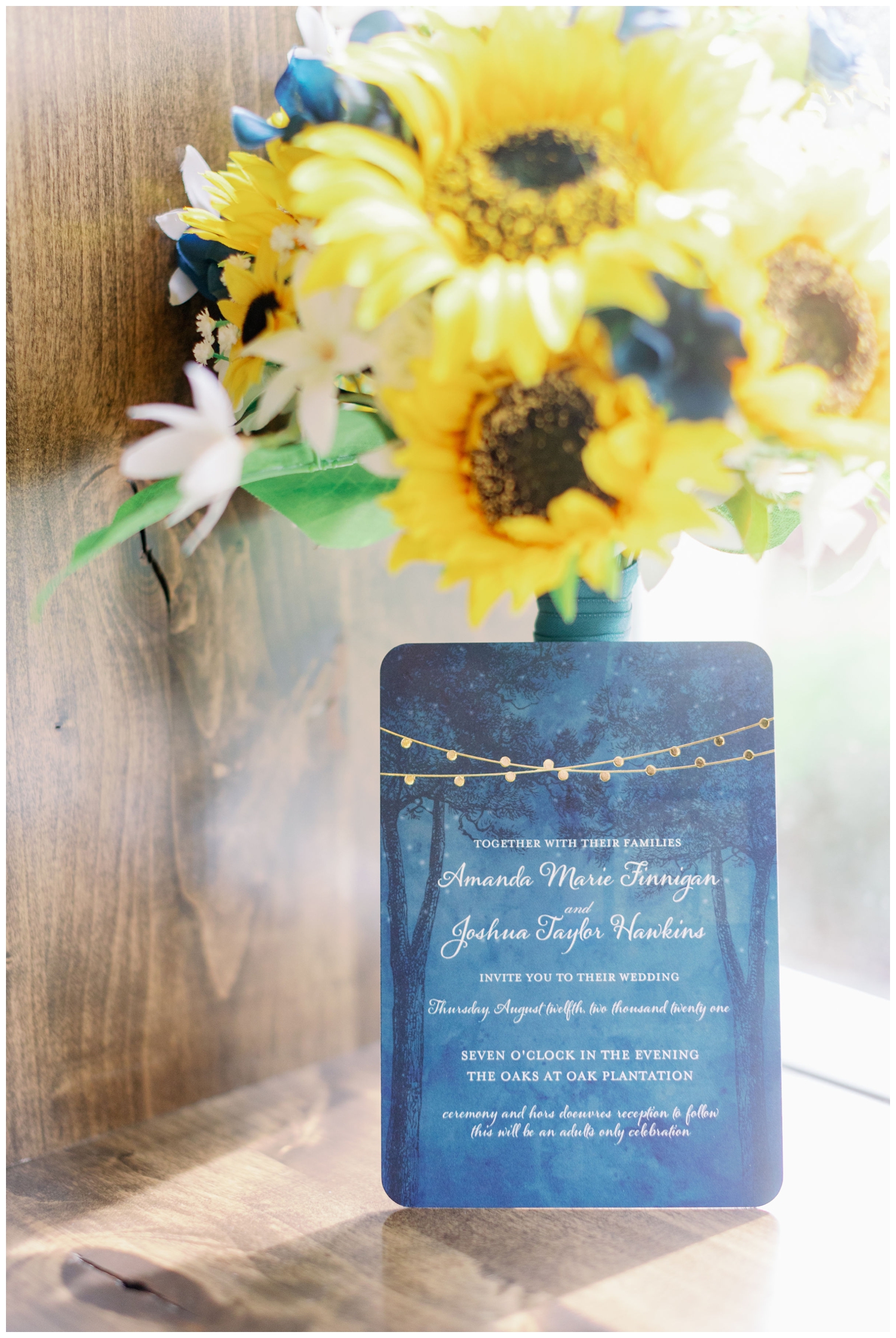 blue invitation suite with sunflower display