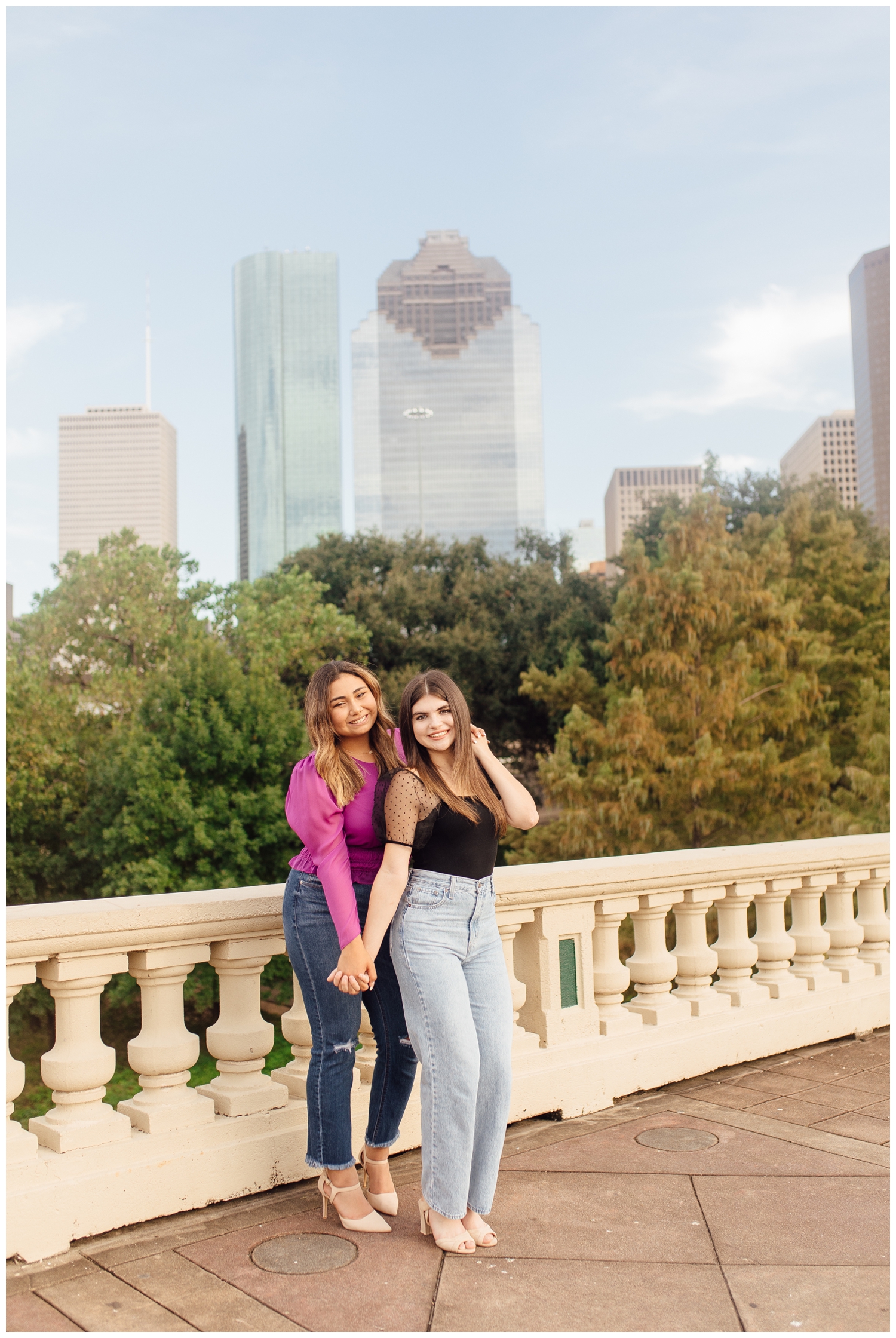 Houston skyline with two girls hugging for portrait for best friends senior session