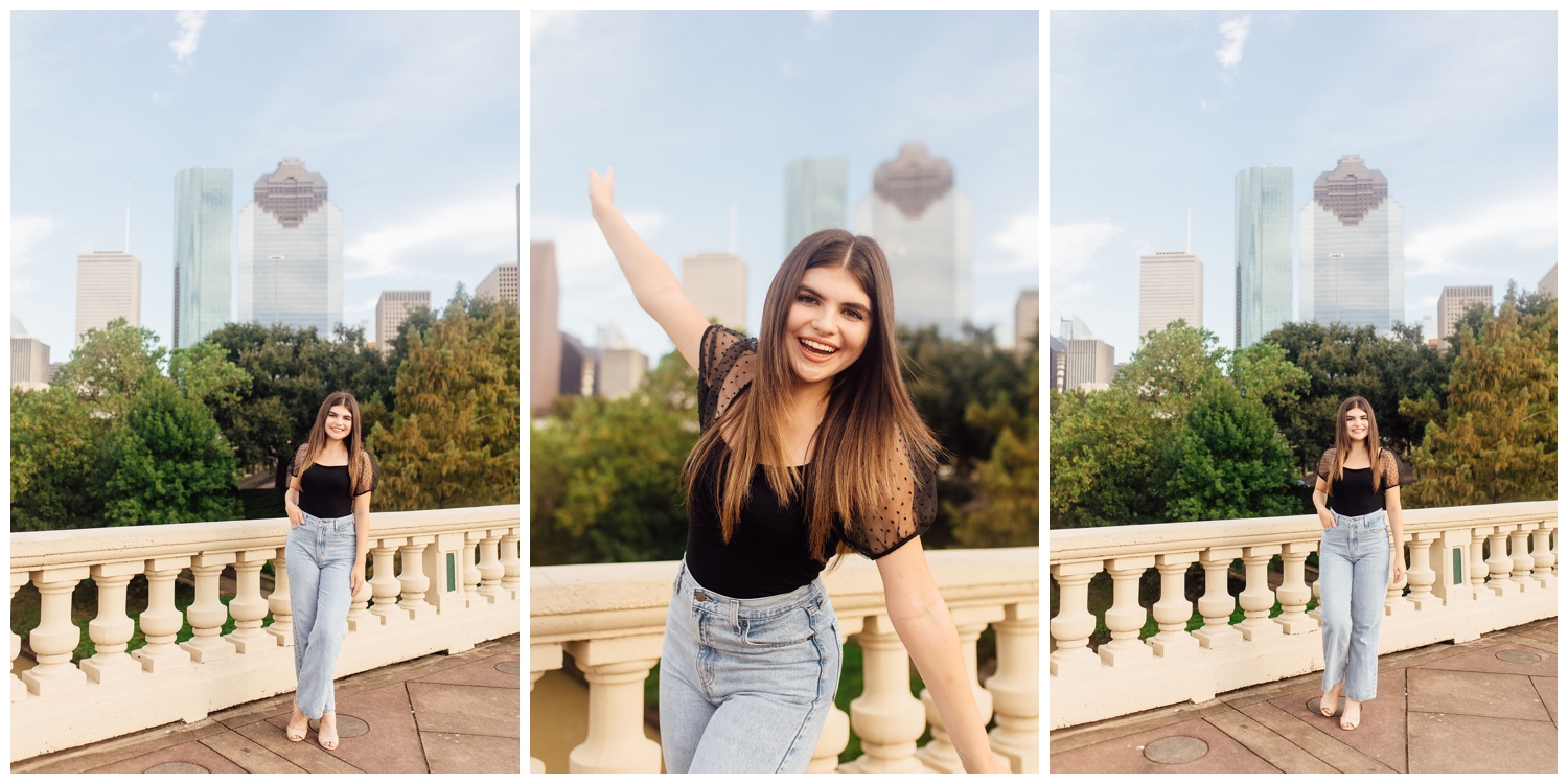 high school girl in jeans and black dress in front of Houston skyline