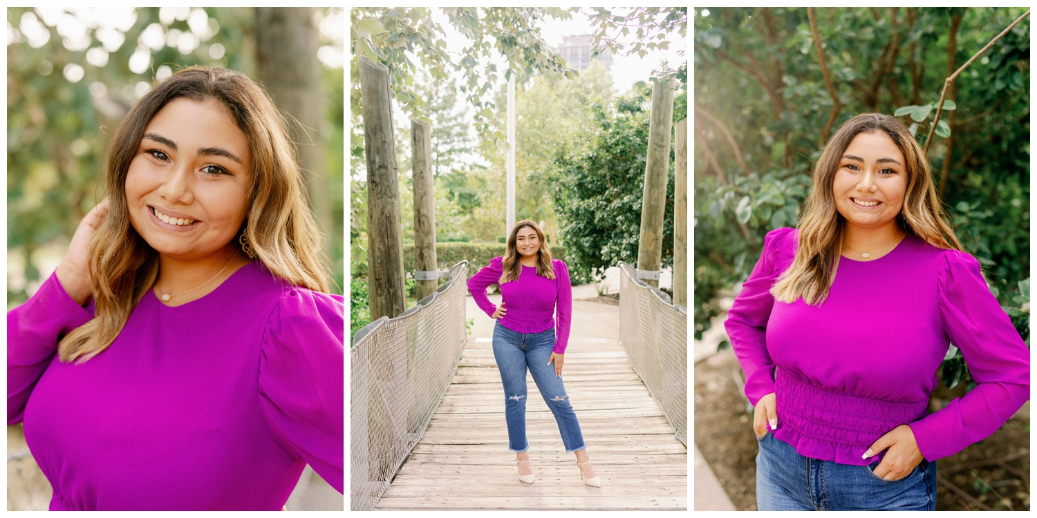 girl in jeans and purple blouse standing on bridge
