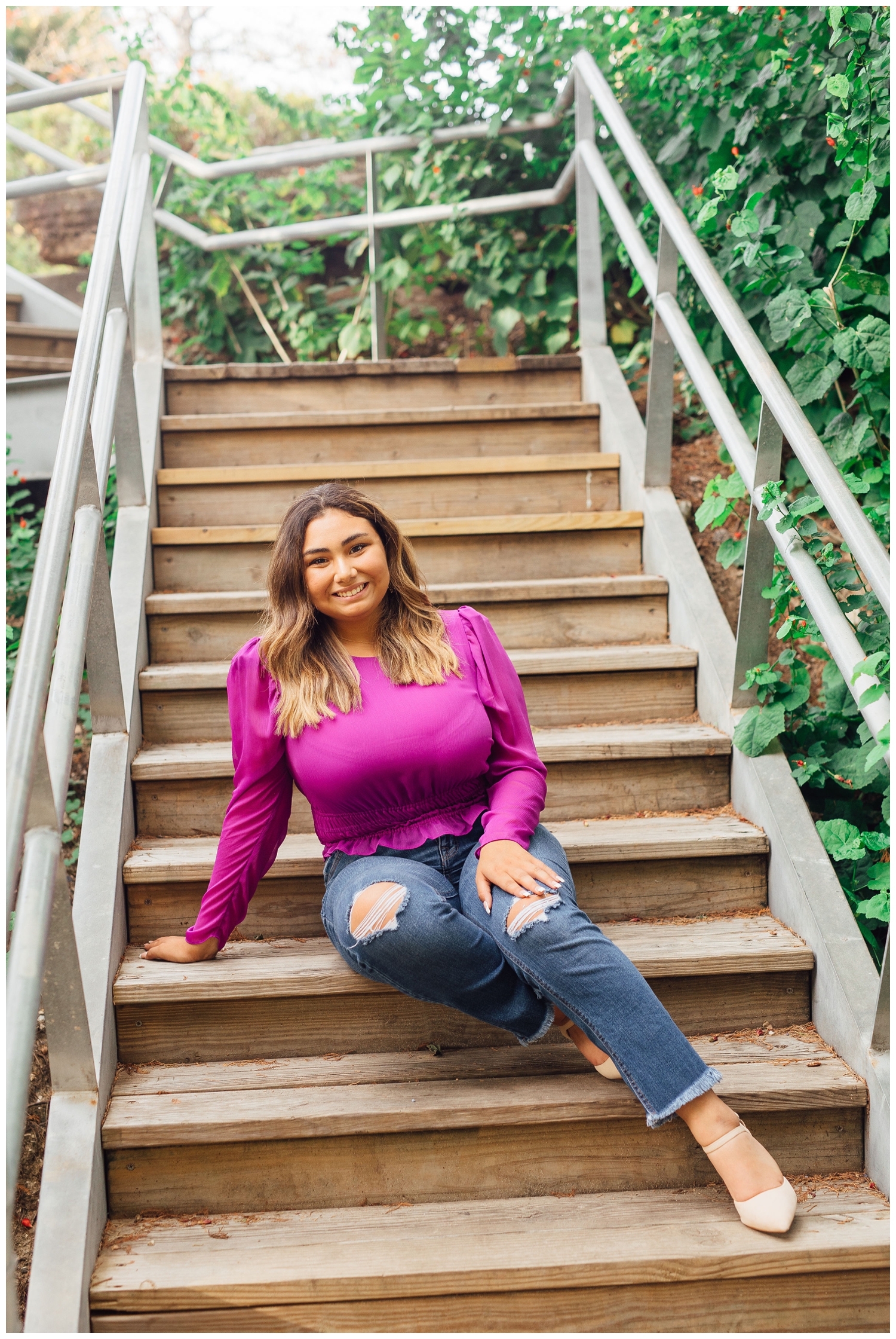 girl sitting on stairs during best friends senior session