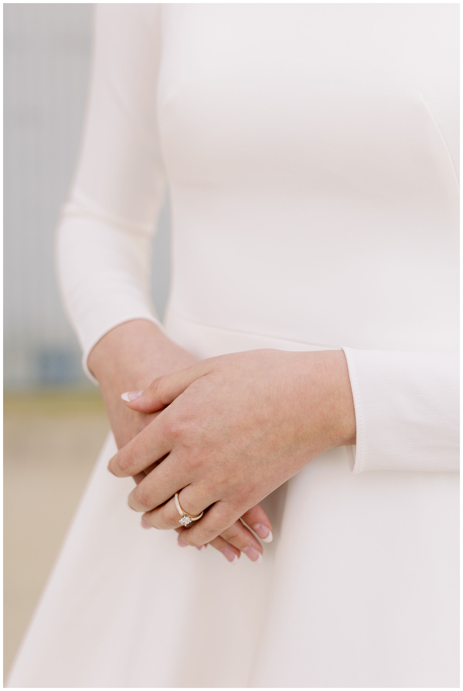 detail shot of bride's hand clasped in front of her waist College Station Bridal Portraits