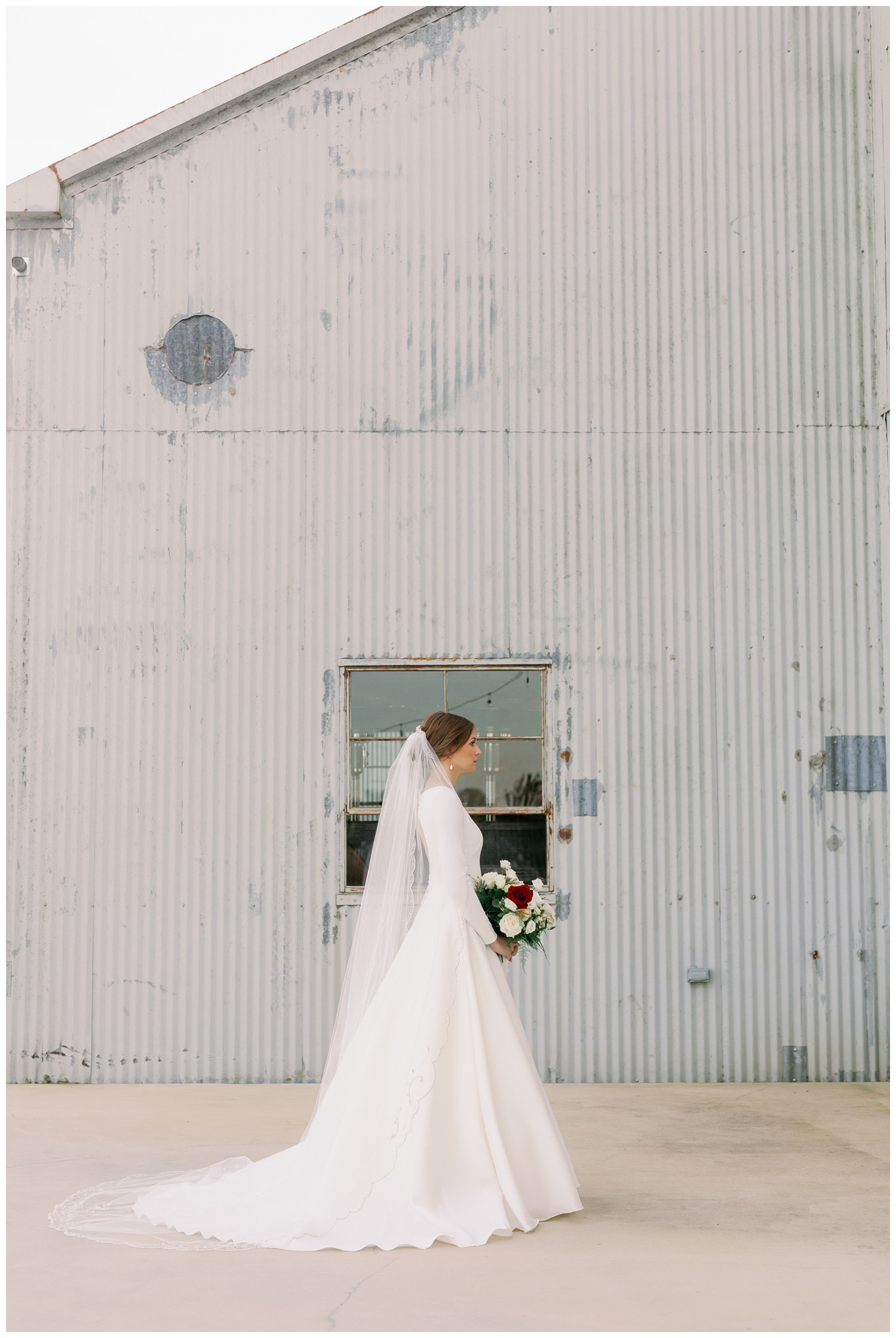 profile image of bride standing outside The Gin at Hidalgo Falls in white wedding gown