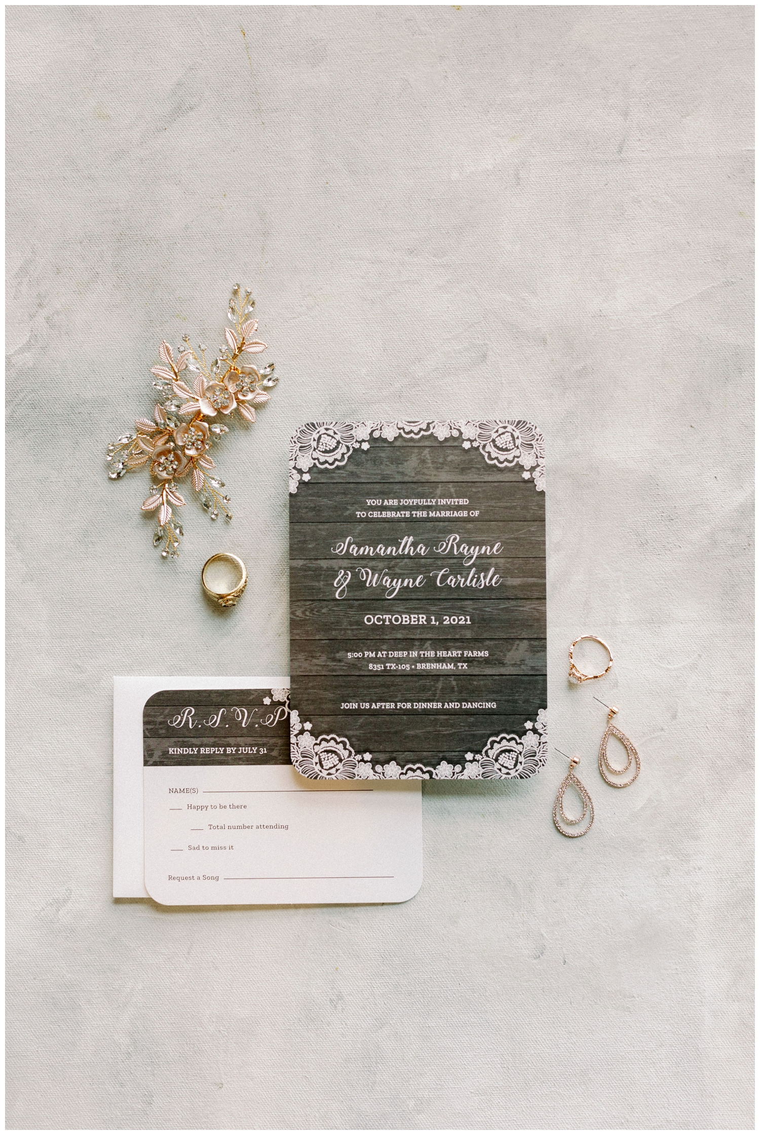 black and white wedding invitation surrounded by jewelry for College Station wedding photographer