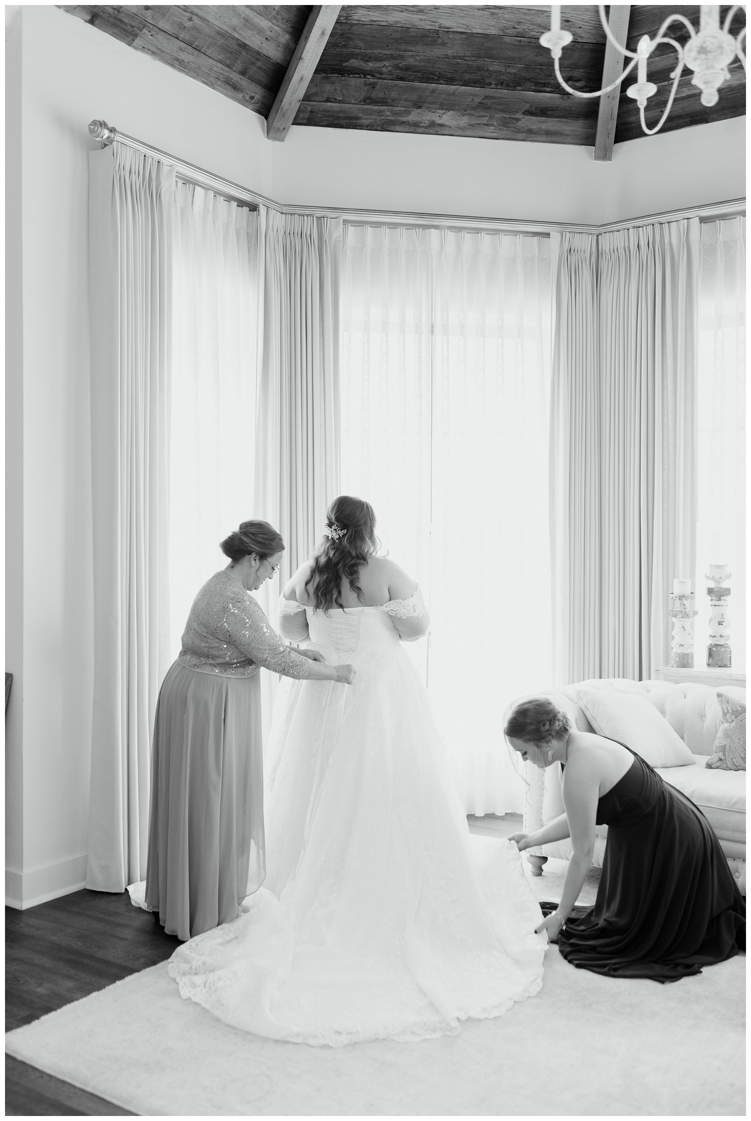 College Station wedding photographer with bride getting ready shot in black and white