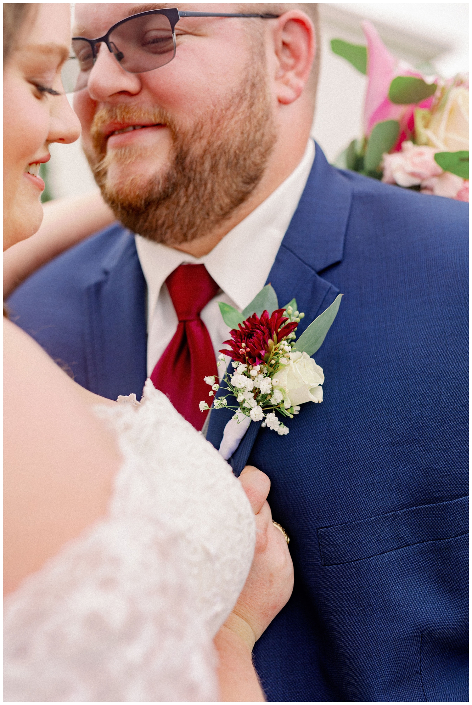 closeup image of bride and groom embracing for College Station wedding photographer
