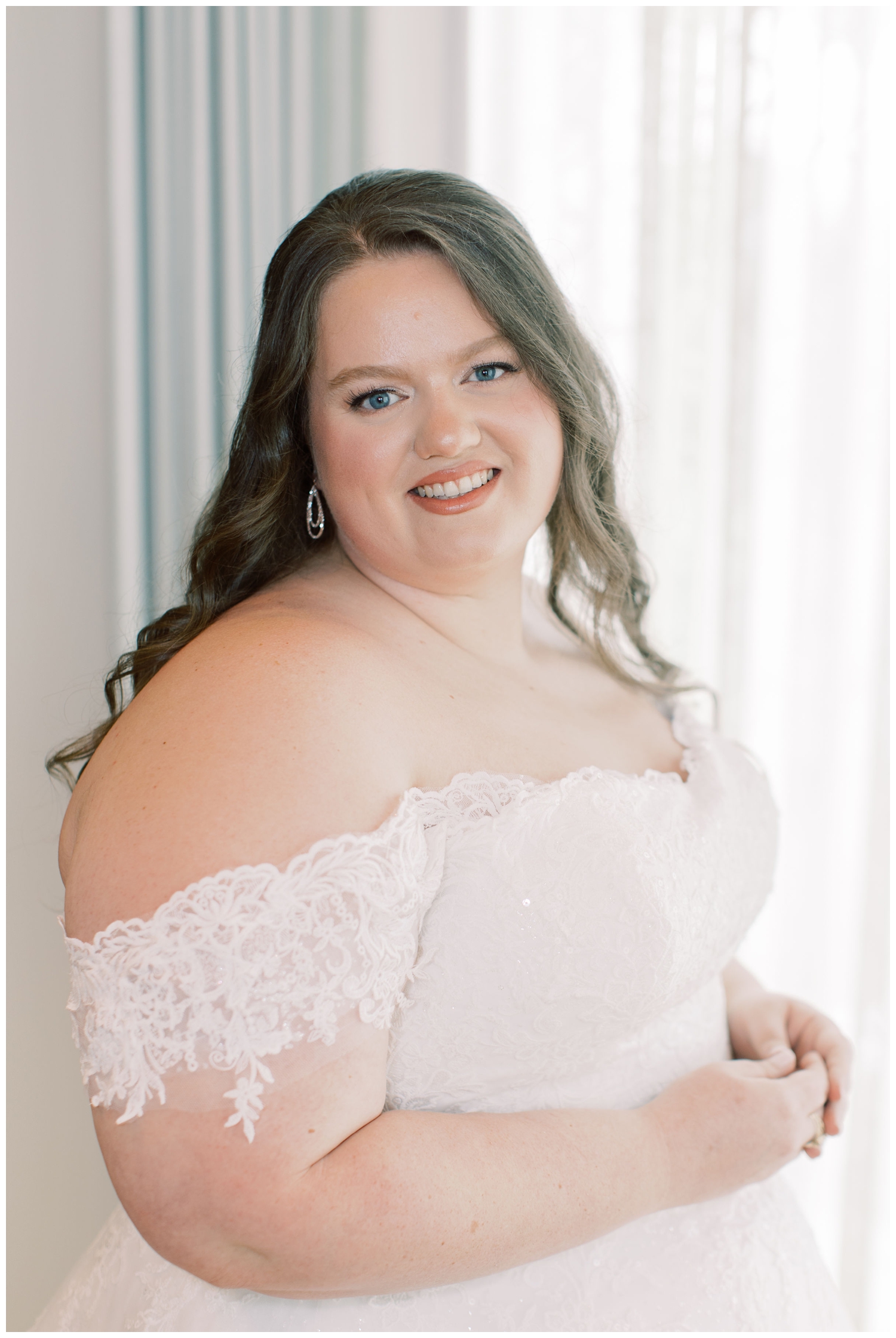 bridal portrait with bride smiling at College Station wedding photographer