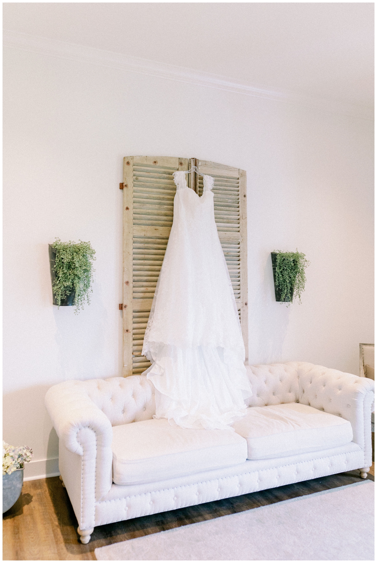 wedding gown hanging inside bridal suite at Deep in the Heart Farms wedding venue