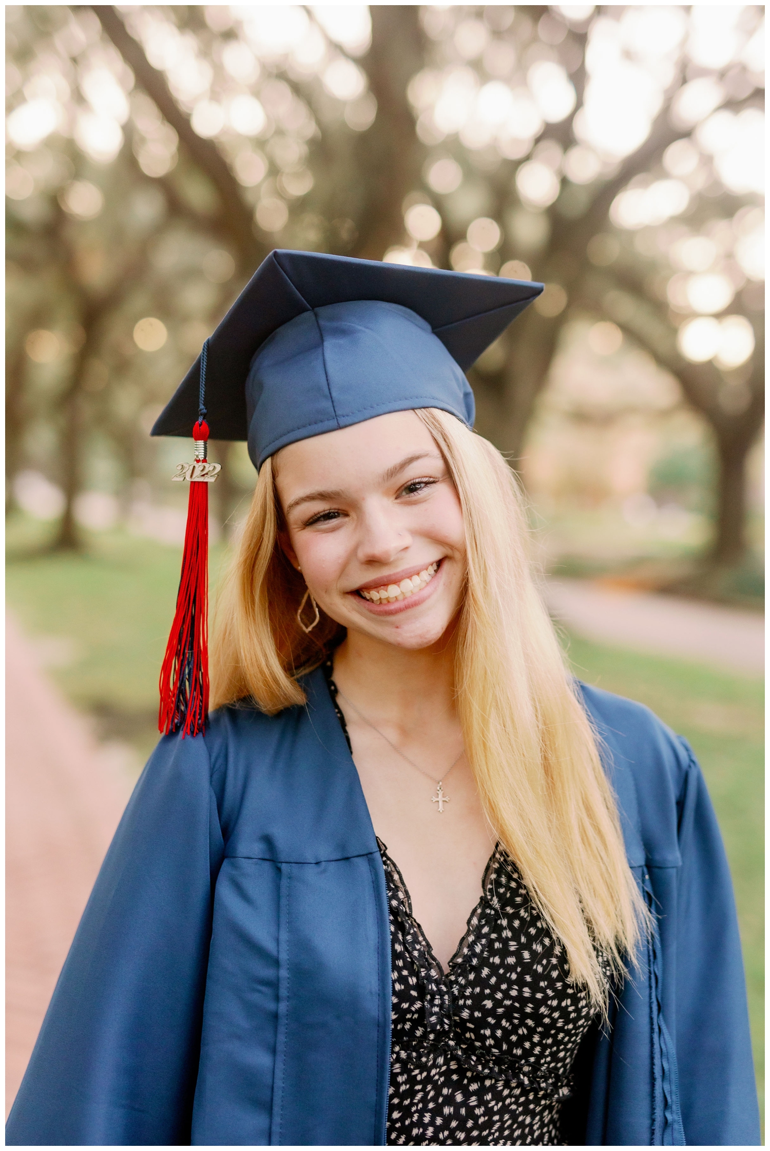 closeup portrait of high school senior wearing blue graduation cap and gown Senior Pictures South Boulevard