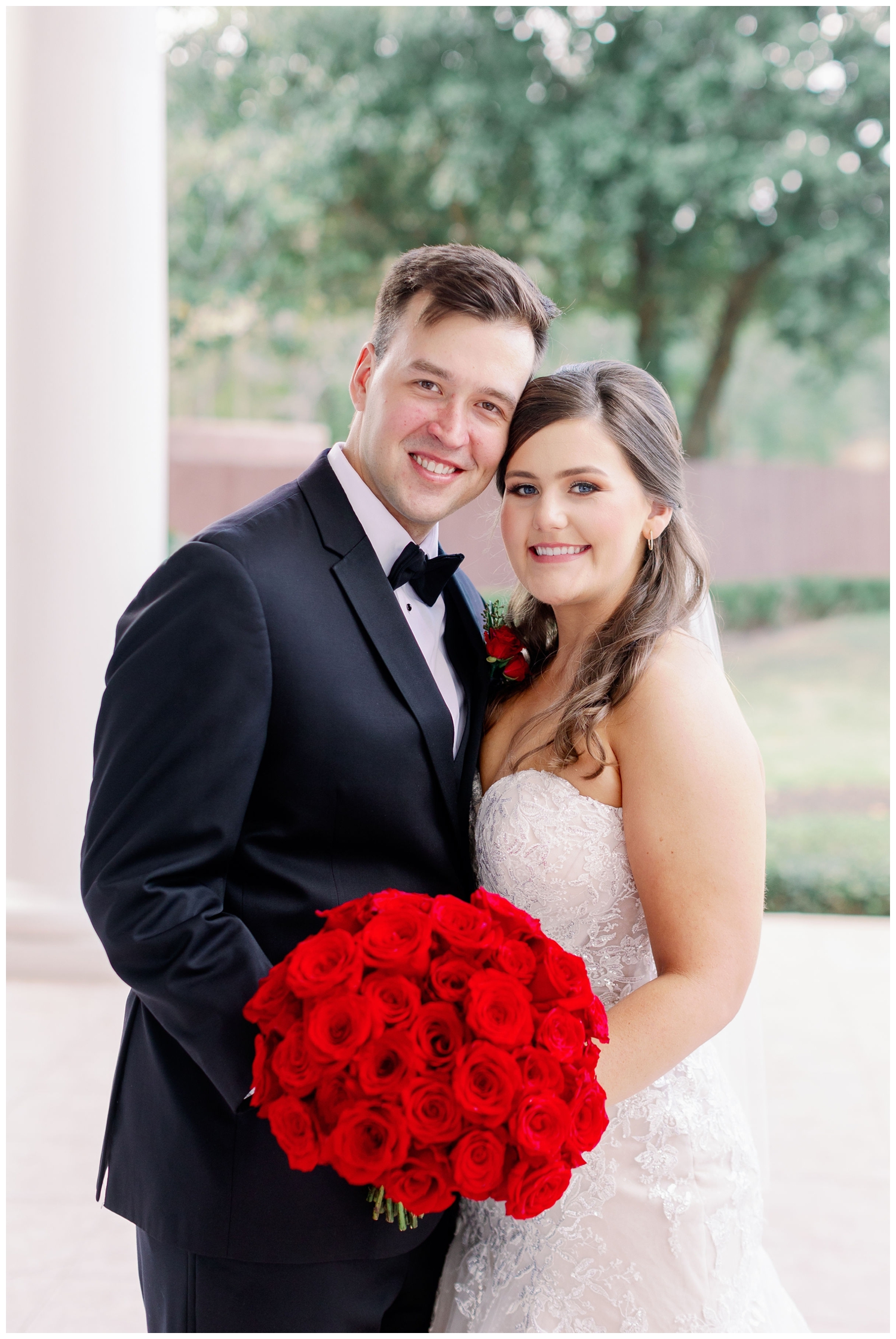 bride and groom smiling at camera for portrait after first look in Sugar Land , Texas
