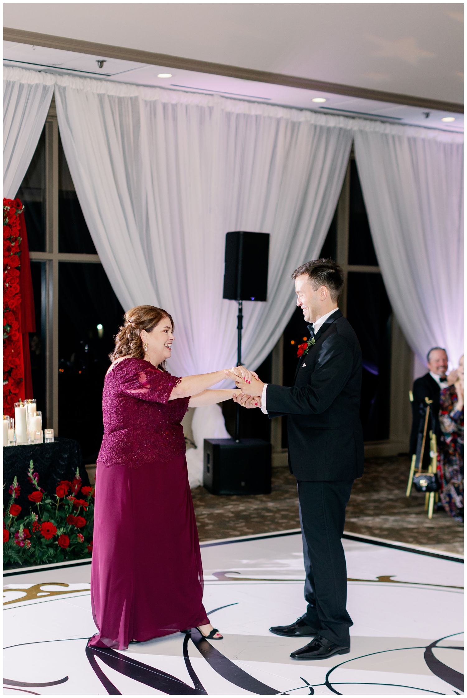 mother and groom reception dancing at Sugar Creek Country Club