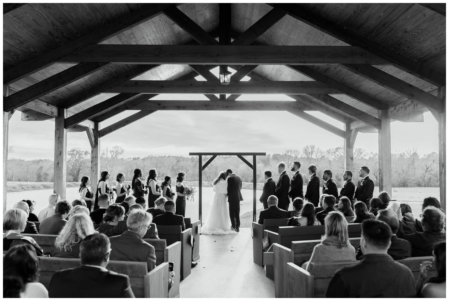 black and white image of winter wedding ceremony at Union Ranch