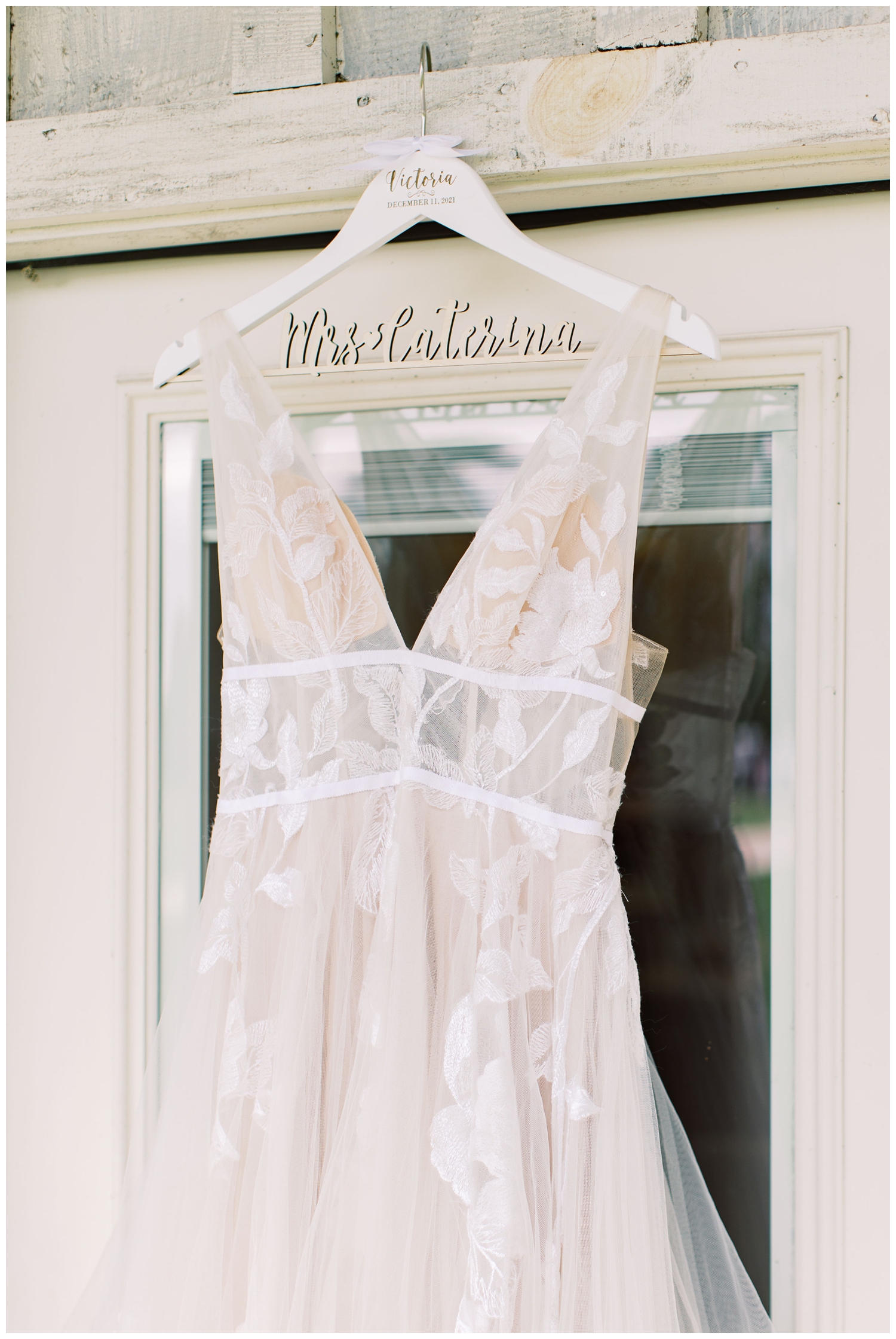 wedding gown hanging with personalized wedding hangar